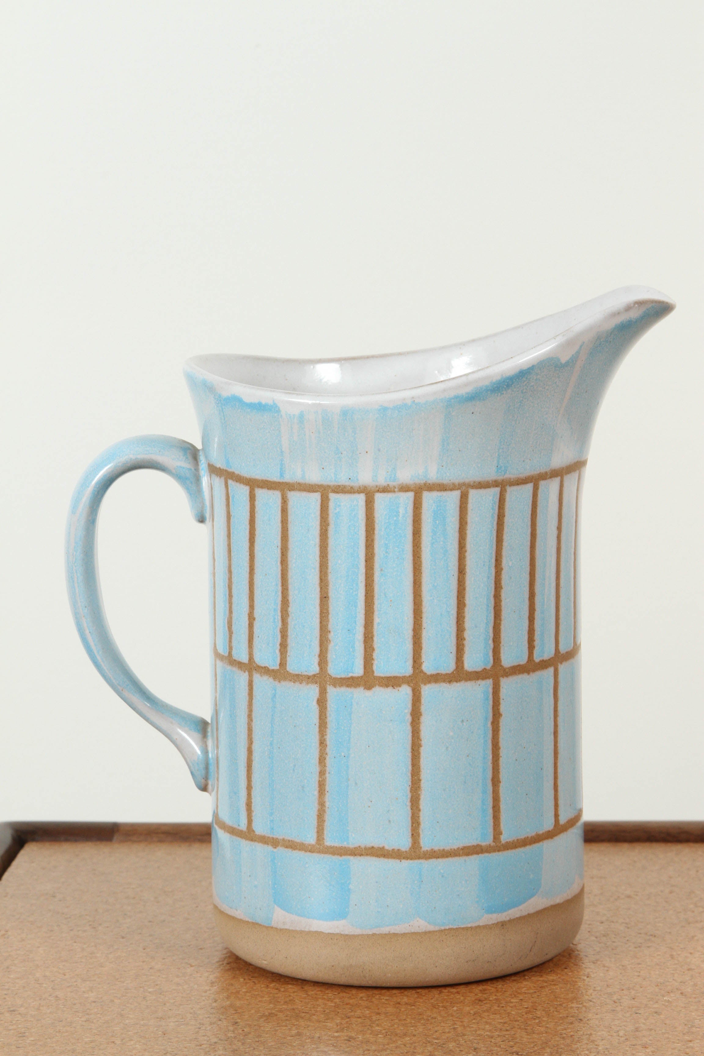 Collection of Ceramic Pitchers by Martz. Dimensions and prices vary. 