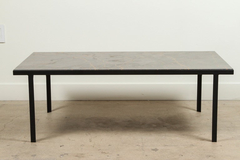 The Montrose Coffee table by Lawson-Fenning features a black powder-coated steel base and Bronzetto marble top.

Available to order in travertine with 10-12 week lead time. 