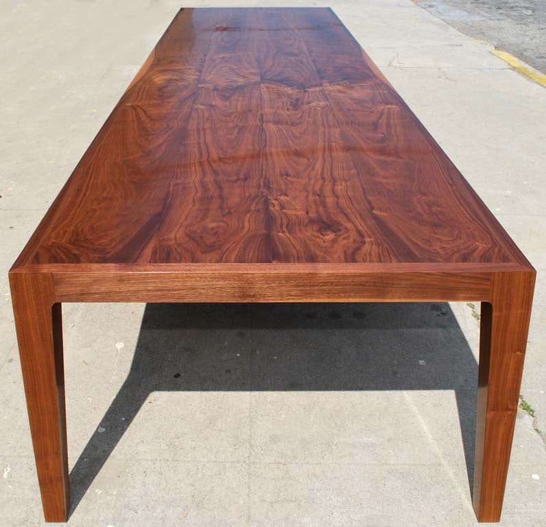 This parsons table is made from solid bookmatched planks of nicely figured walnut (not veneer), beautifully finished for a soft satin feel.

Because each table is bench-made in our own Los Angeles workshop you can influence all aspects of design,