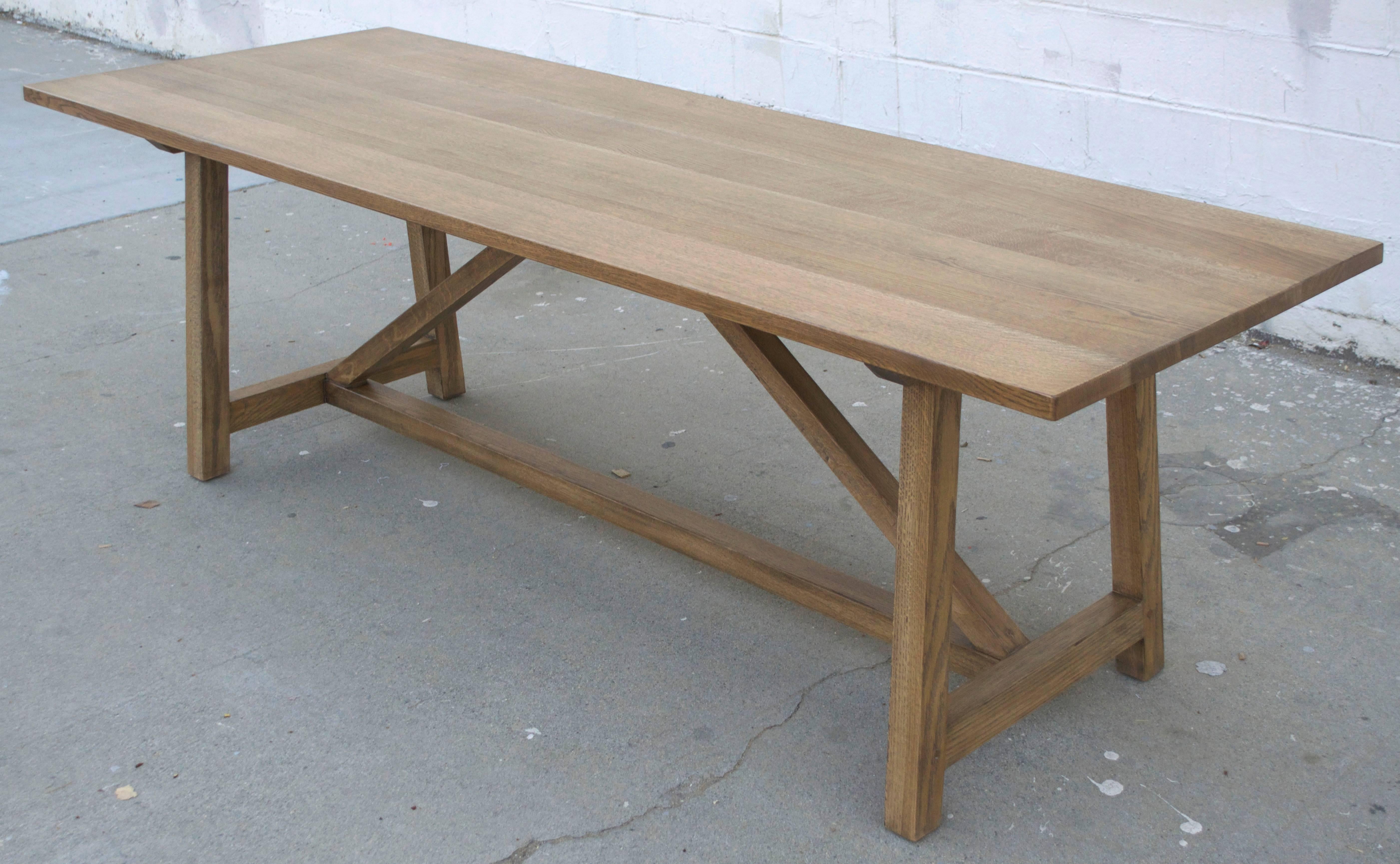 Custom dining table in distressed, rift-sawn, white oak. 

Because each table is bench-made in our own Los Angeles workshop you can influence all aspects of design, including size, wood species and finish. We use only traditional carpentry