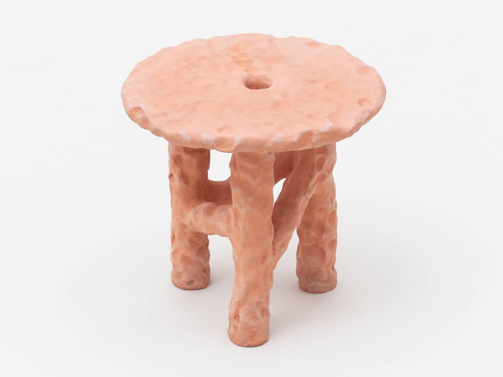 Handmade terracotta side table by New York based artist Chris Wolston. Can be used indoors or outdoors. Each table is unique. Custom works available.