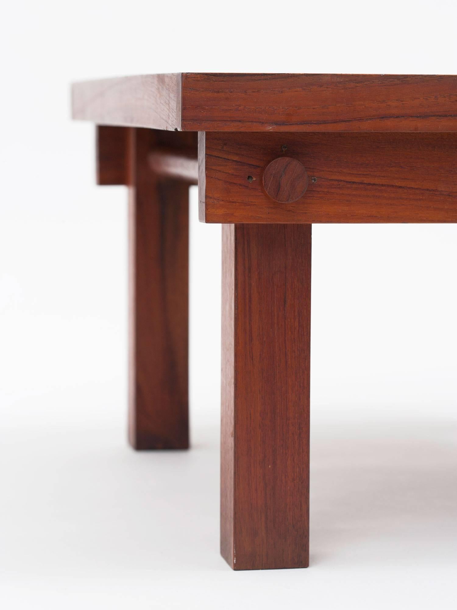 Modernist teak table by the Indian designer Mini Boga for her furniture company Taaru. Two available.

Minnie Boga (b. 1932) founded the New Delhi-based contemporary furniture brand Taaru in 1968. Apart from being one of the first prominent woman