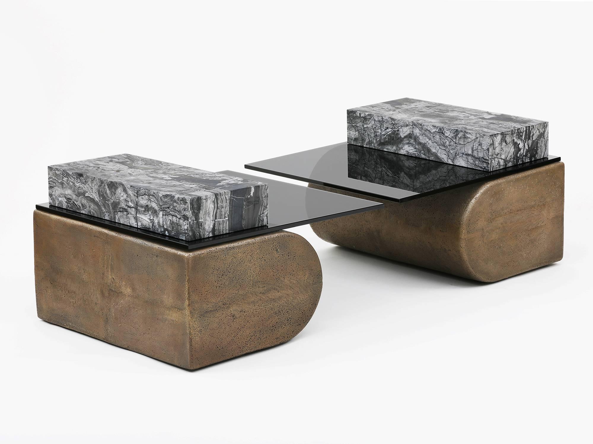 Cantilever tables by Los Angeles based designer Brian Thoreen. Made of marble, bronze glass, cast bronze. Custom material combinations available - including grey glass and red and brown marble. Edition of 8 + II AP. Sold individually for $22,500