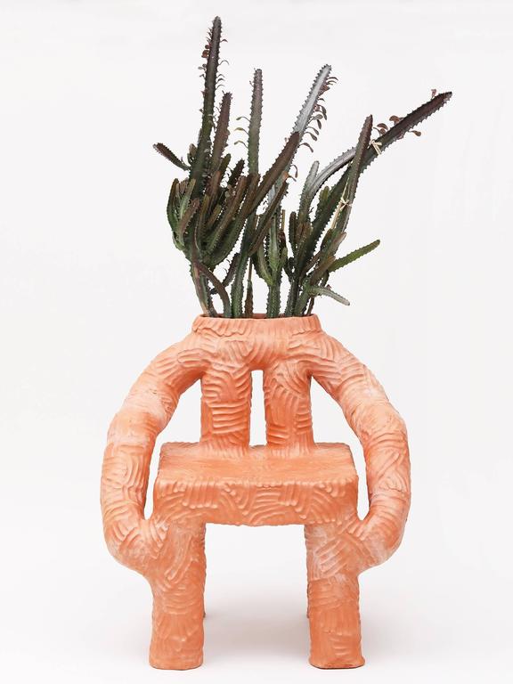 Chair and planter handmade of solid terracotta by New York and Medellín-based artist Chris Wolston. Can be used indoors or outdoors – Please note, this cannot be left outside during the winter months in environments where the temperature falls below