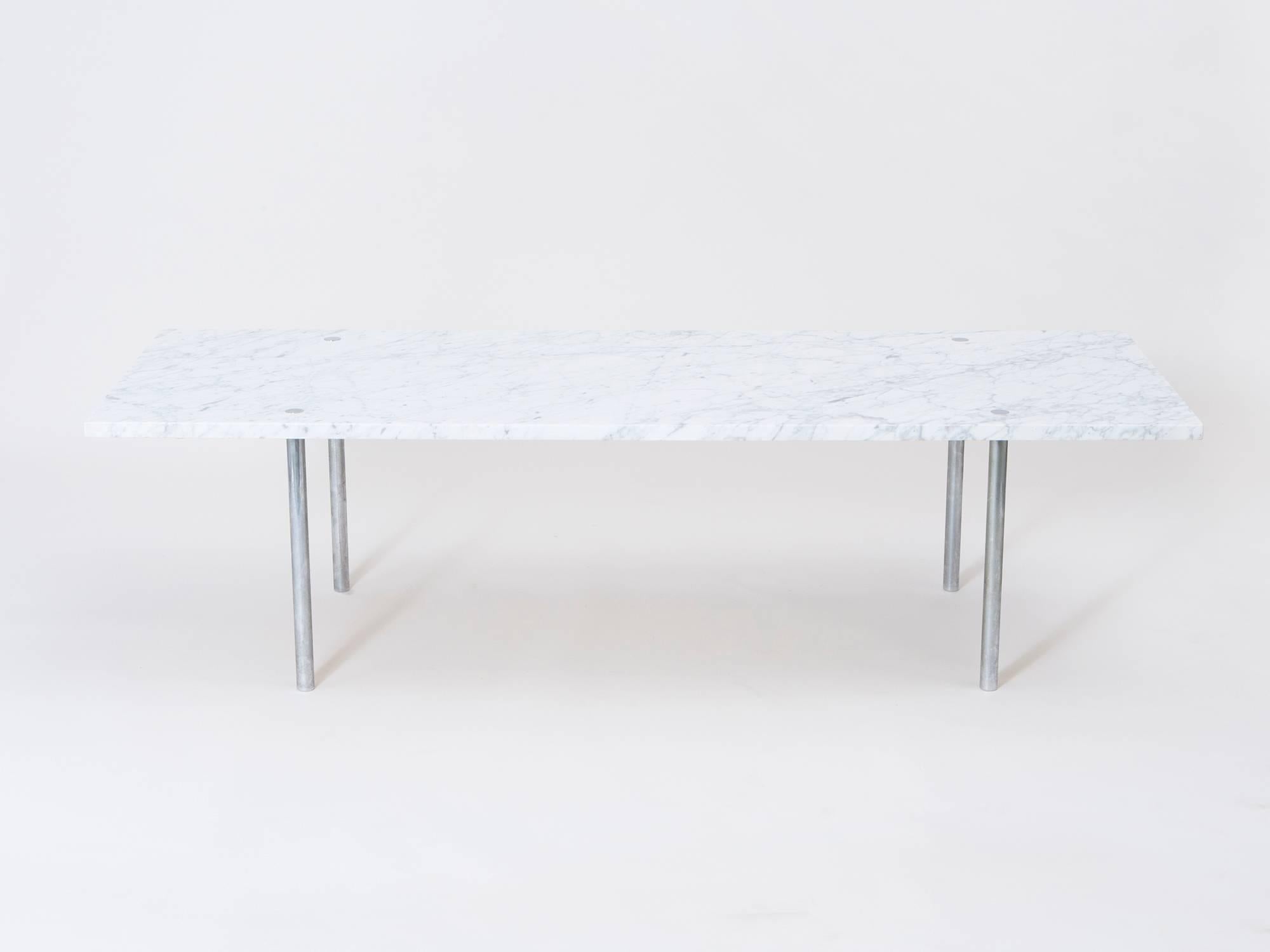 Strikingly simple and elegant Carrara marble and chrome-plated steel modernist coffee table by architectural design team William Katavolos, Doug Kelley & Ross Littell for Laverne.