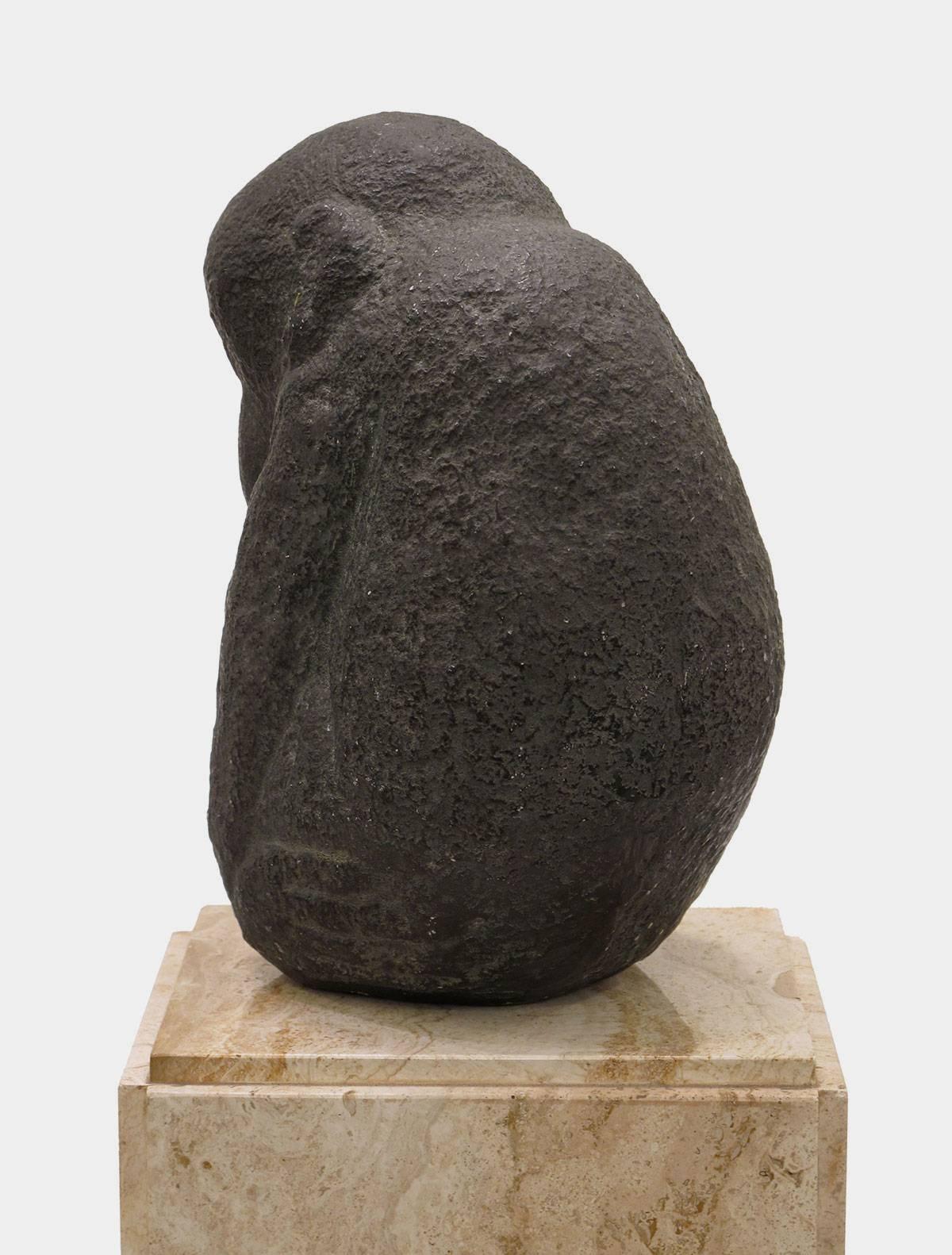 A cast-stone edition of a granite sculpture by American artist John Bernard Flannagan (1895-1942). Along with Robert Laurent and William Zorach, Flannagan is known as one of the first practitioners of direct carving in the United States. His work is