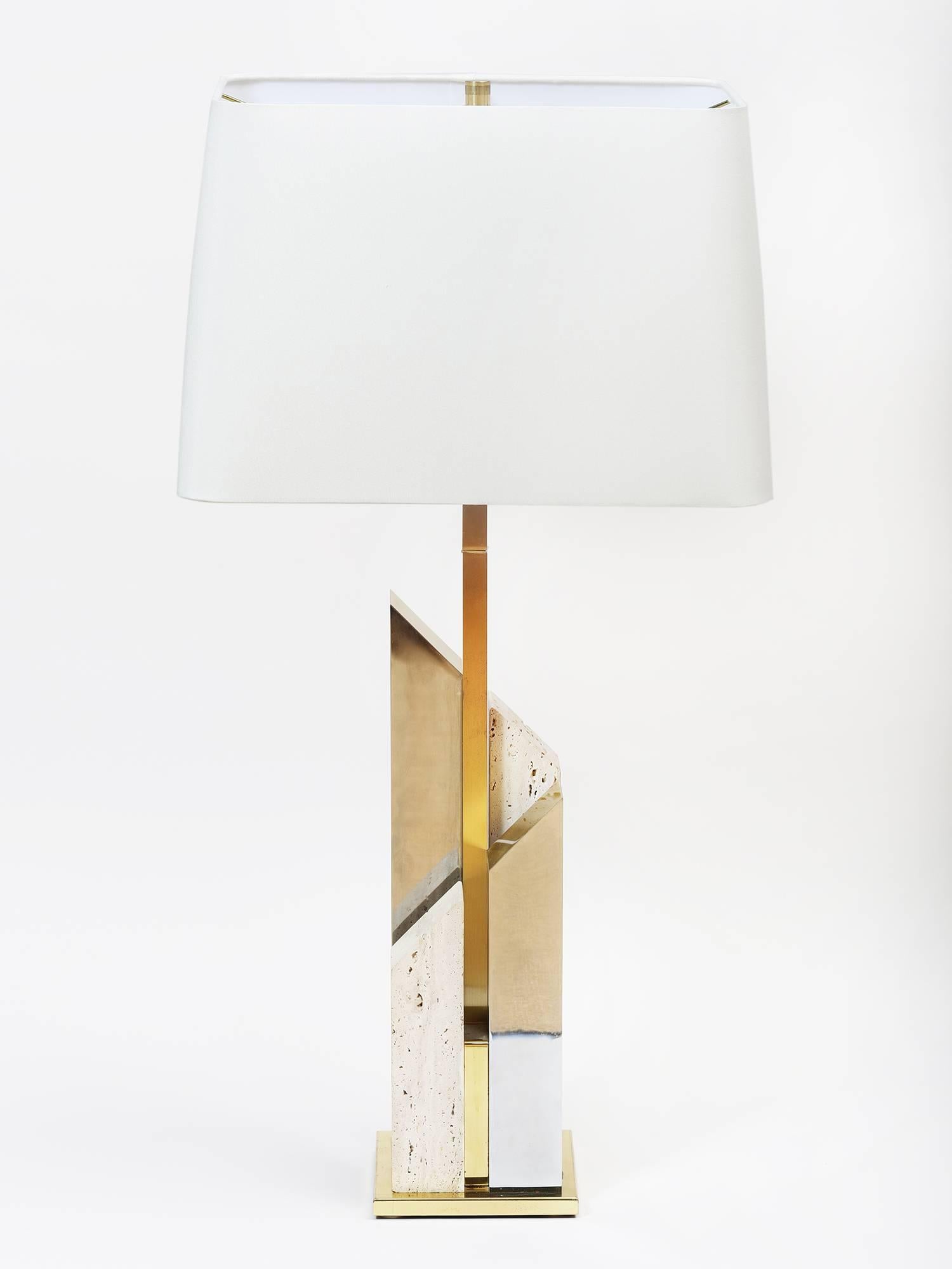 Italian table lamp by Gaetano Sciolari made of travertine, chrome-plated metal and brass.