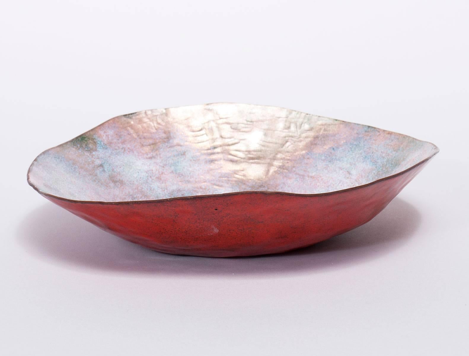 Beautiful coral colored enamel over copper low bowl with pearlized interior, designed and executed by Paolo De Poli, circa 1950s. Signed with sterling silver plaque.