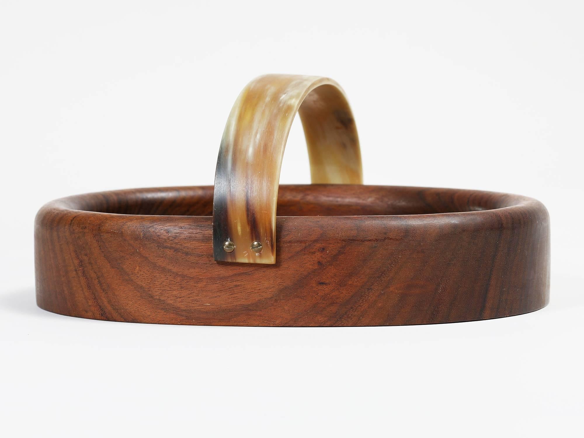 Handled bowl made of carved walnut and horn by Viennese master designer Carl Auböck.