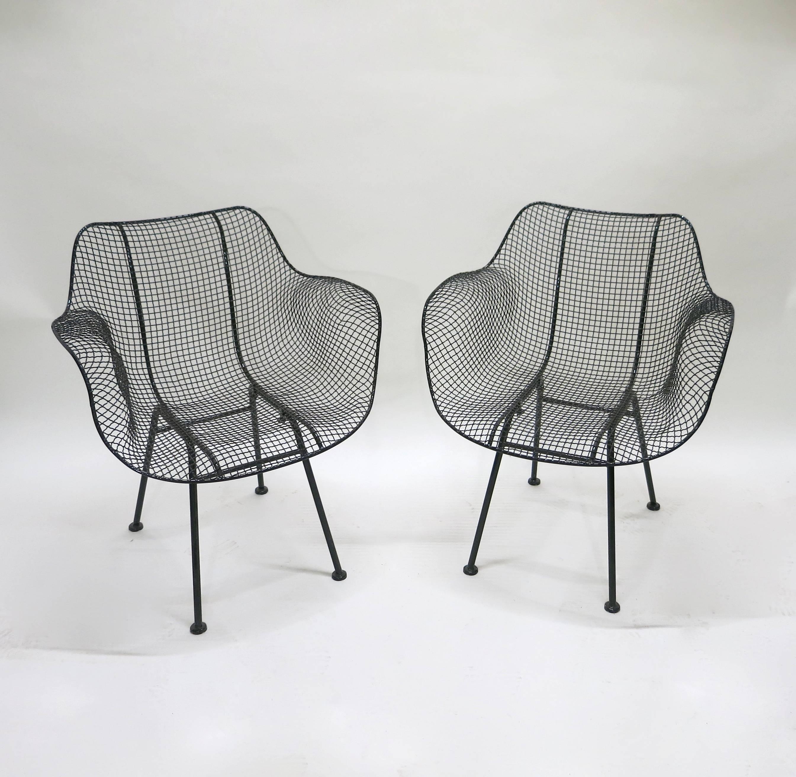 Six vintage dining height armchairs from Woodard's 'Sculpture' line, recently powder coated in a gloss black finish and all in excellent condition. Indoor and outdoor use.