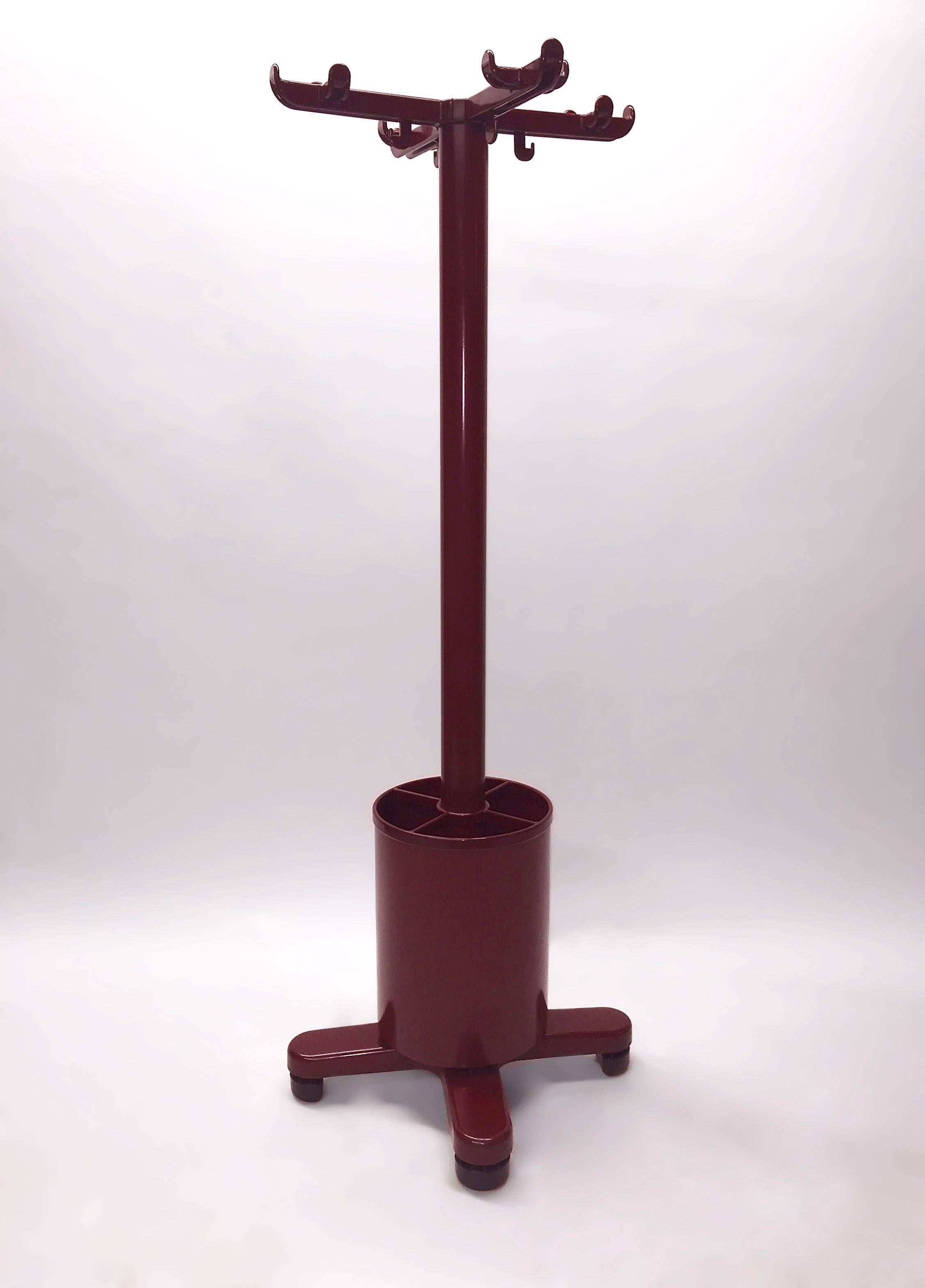 Freestanding coat rack has an umbrella stand resting on the base. Synthesis coat rack was designed in 1973 by Ettore Sottsass for Olivetti.
 