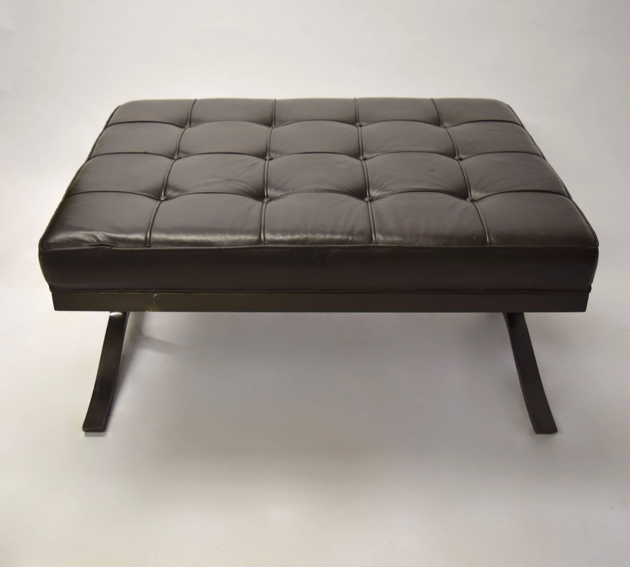 Original bench has a solid patinated bronze frame with original brown tufted leather seat.
Was available by special order only from 1963-1999.
In 2000 the bench was revised to a more rectangular shape.

  