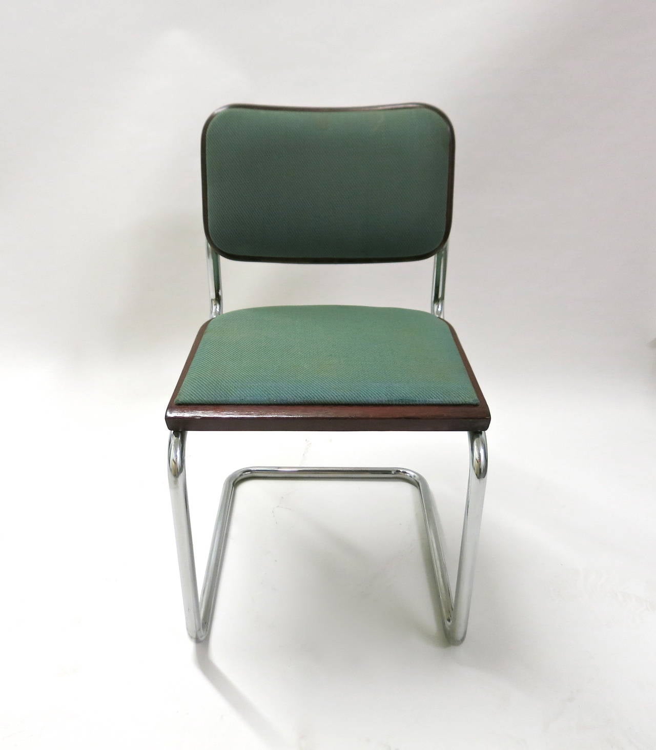 Over 100 Cesca chairs available, signed and dated, with wooden frames and upholstered seats. Original design by Marcel Breuer in 1928 for Bauhaus. All chairs produced by Knoll International in 1985, purchase for the Pacific Bell Company. Each chair