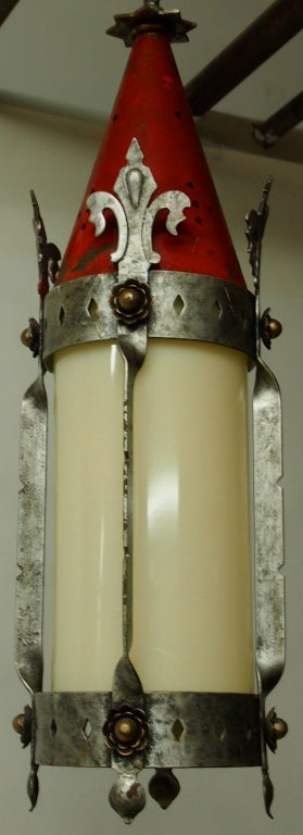Early 20th century ceiling fixture with a metal frame, a hand blown opaque glass shade, and a red enameled metal conical shaped top, original Rambusch label.
 