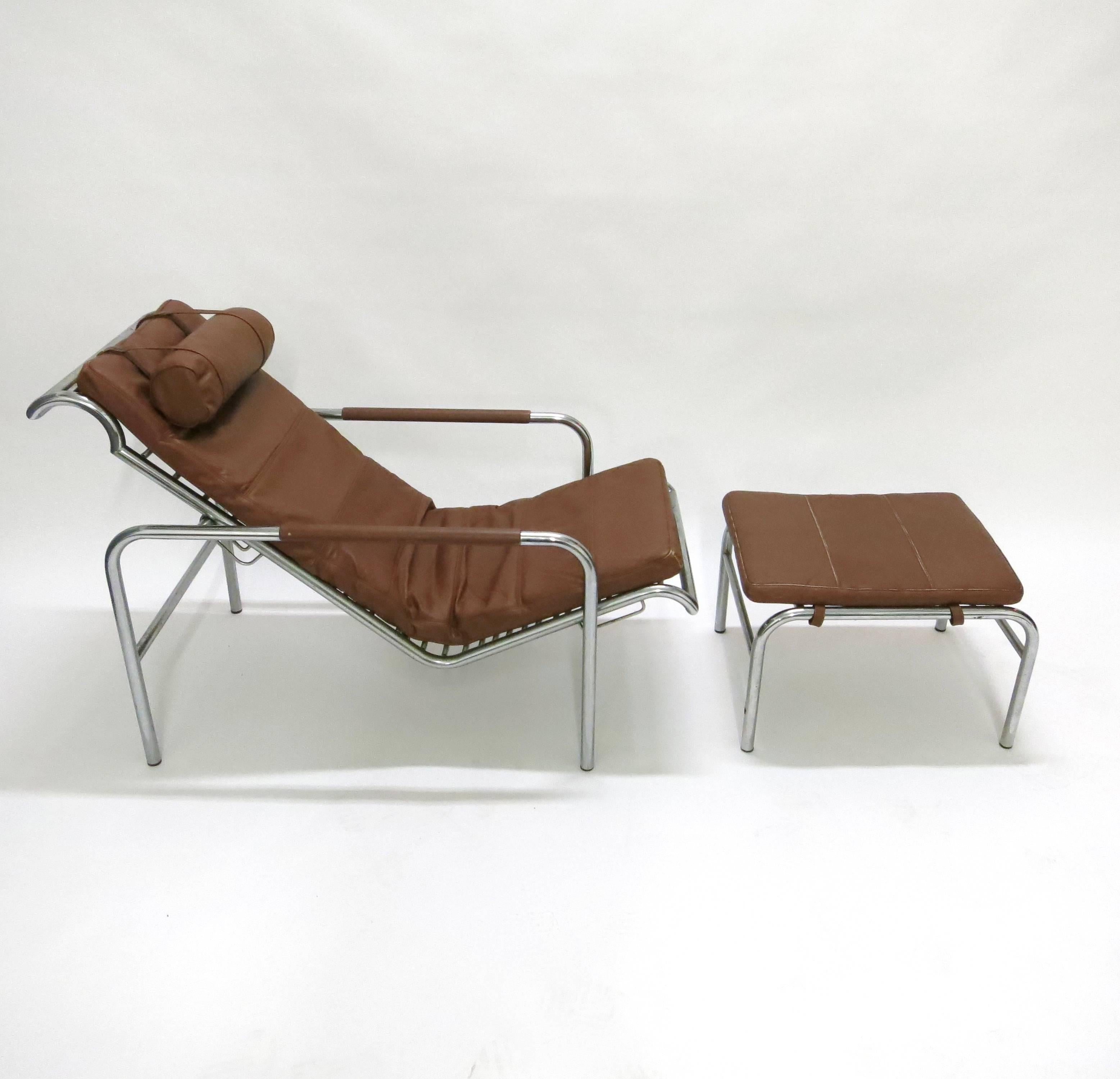 Genni chaise and ottoman was designed in 1935 by Gabriele Mucchi for Zanotta. The lounge and ottoman has three original leather cushions one for a headrest the longest for the lounge and one for the ottoman. The frame is polished tubular steel with