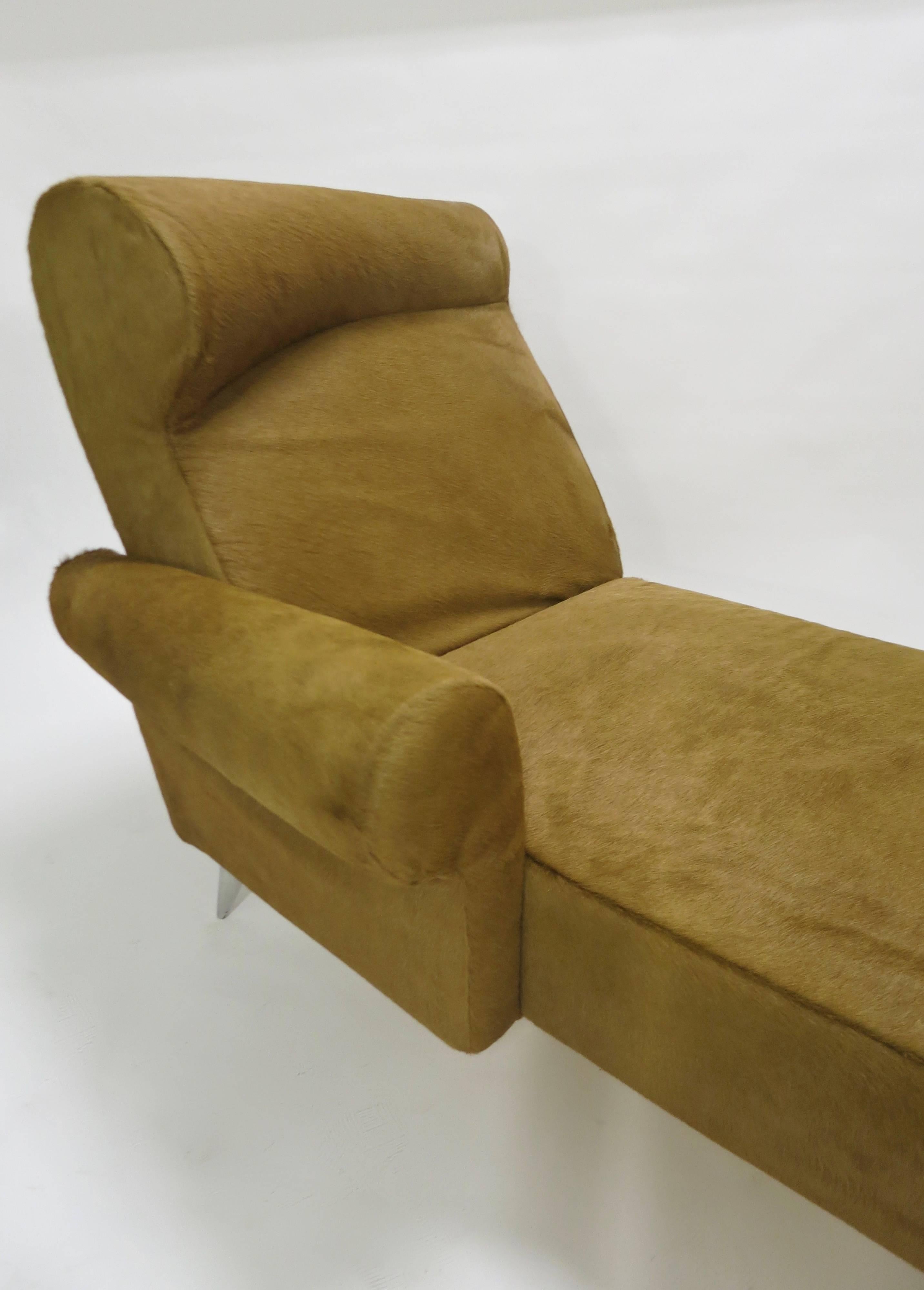 Single arm chaise longue designed by Philippe Starck and Manufactured in Italy by Driade. The chaise has the original muslin over polyurethane padding covered in long haired cowhide that is detachable and four polished cast aluminum legs.