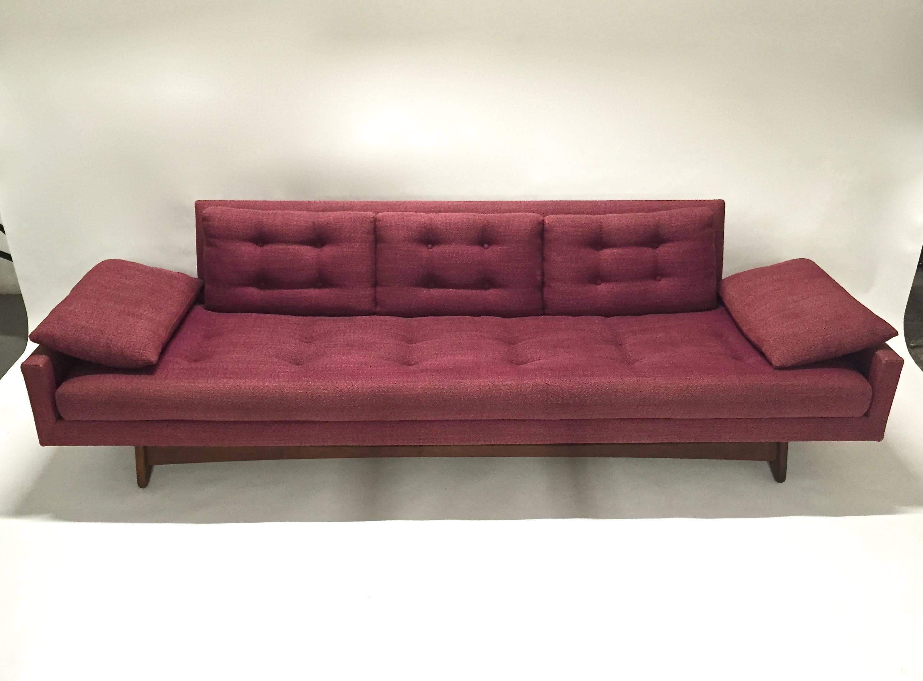 Sofa in original condition designed in the 1960s by Adrian Pearsall and manufactured by Craft Associates. Sofa model #2408 is all original. The fabric has no tears or worn spots but slightly faded under pillows.
     
     
    