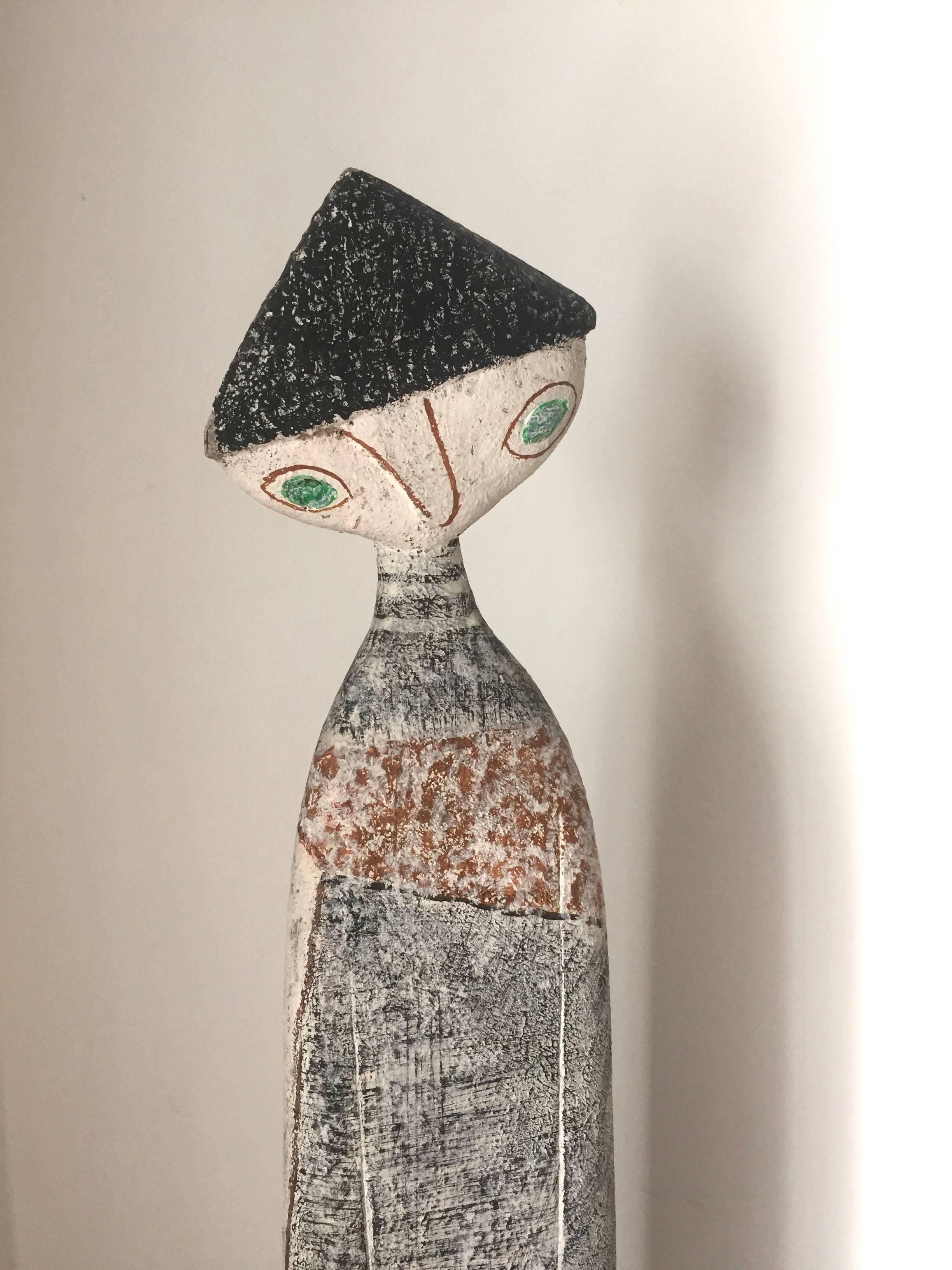 La scultura francese deco di Jean Lambert-Rucki è un esempio stravagante di guerriero normanno con cappello a punta e paranaso, una scultura in legno che ha mantenuto bene i suoi colori.
 