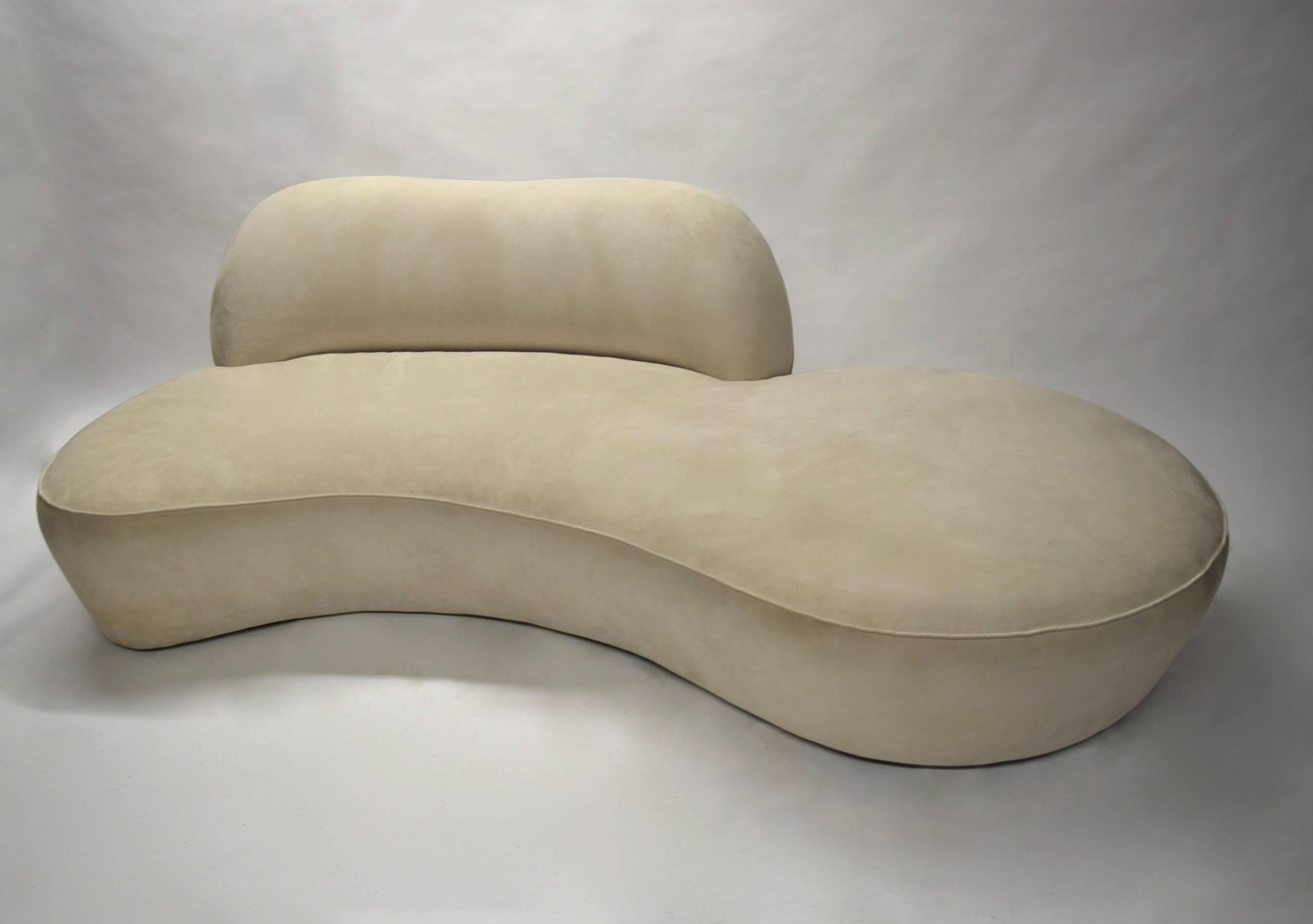 Sofa is in original off white microsuede. Single owner lightly used in great vintage condition.