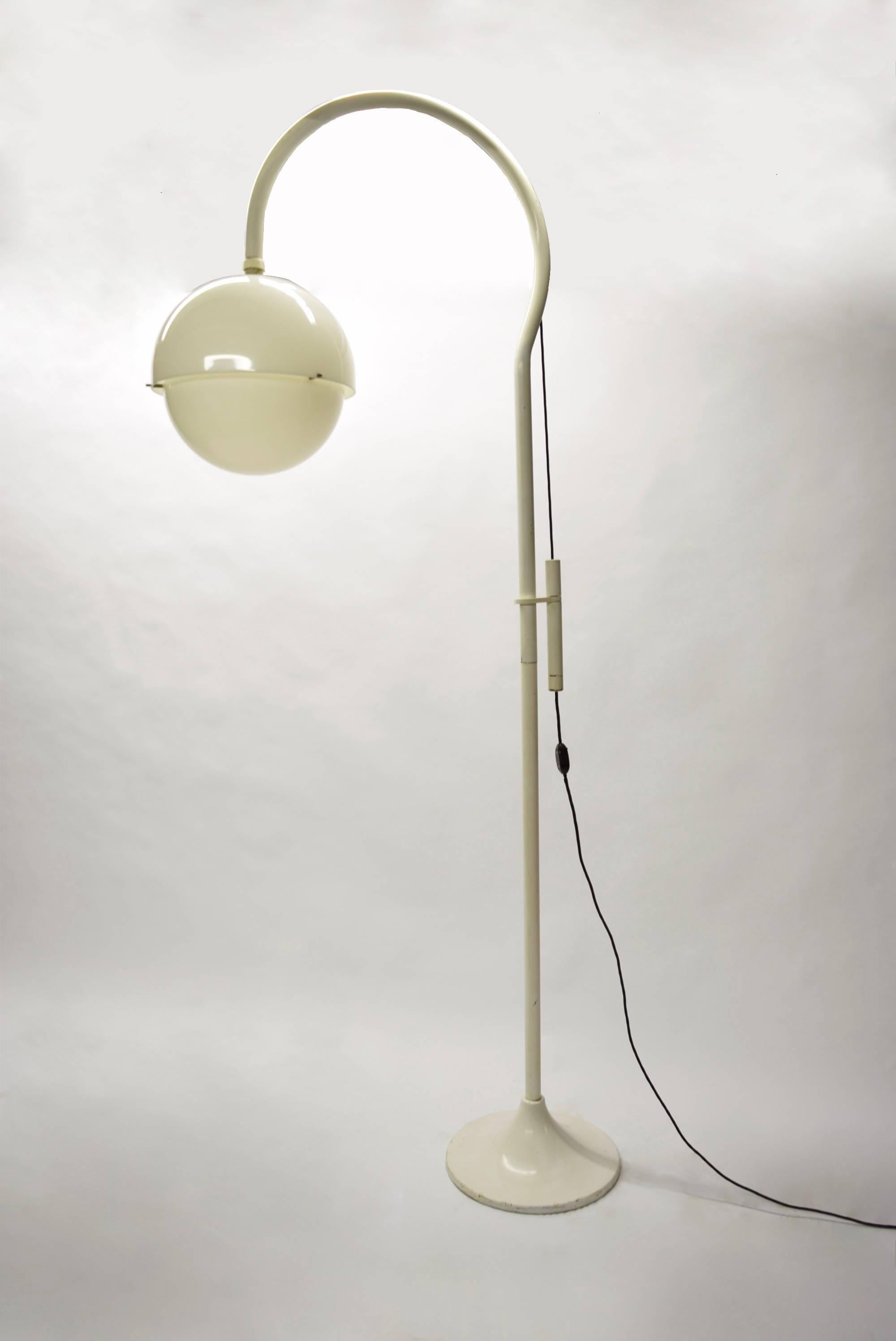 large floor lamp in lacquered metal and acrylic. Height of globe can be adjusted by pulley and counter balanced weight. The metal arm that holds the globe rotates. All original condition.

