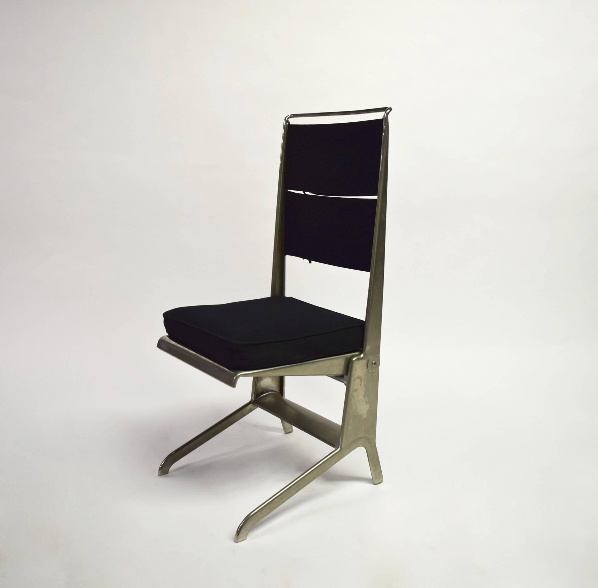 Jean Prouvé designed chairs have a nickel plated steel frame utilizing his 