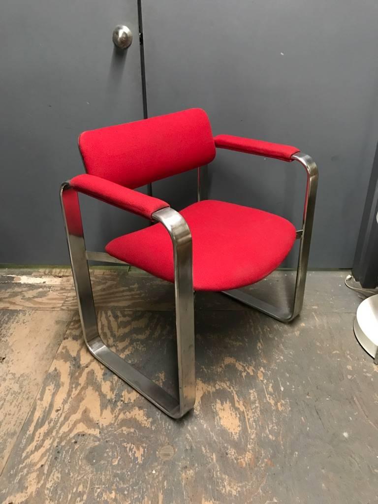 Armchair designed by Eero Aarnio for Mobel Italia in red woven fabric and a polished aluminum frame.