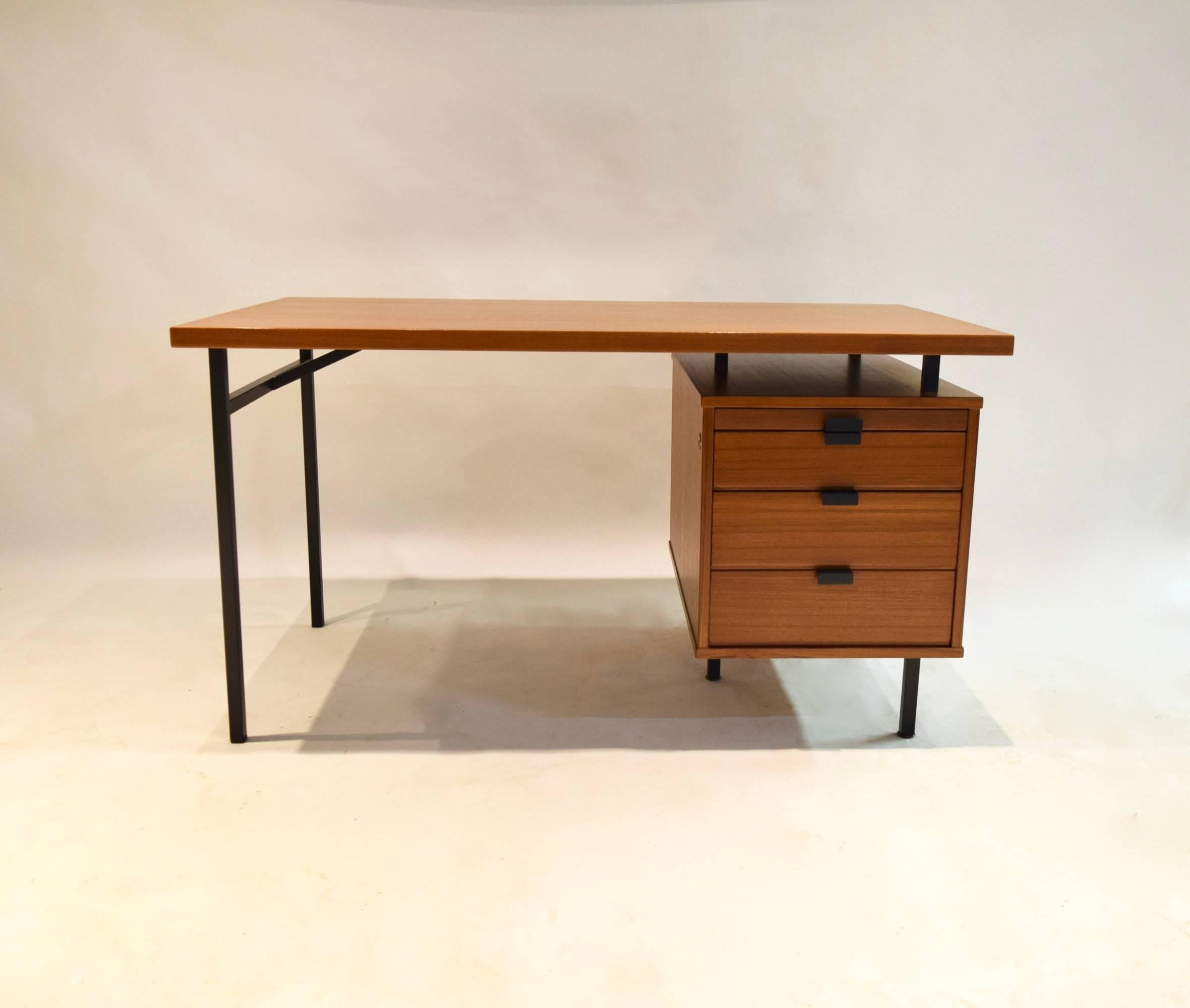 Desk with four pull-out drawers, a black enameled steel frame with matching pulls, and 1.5