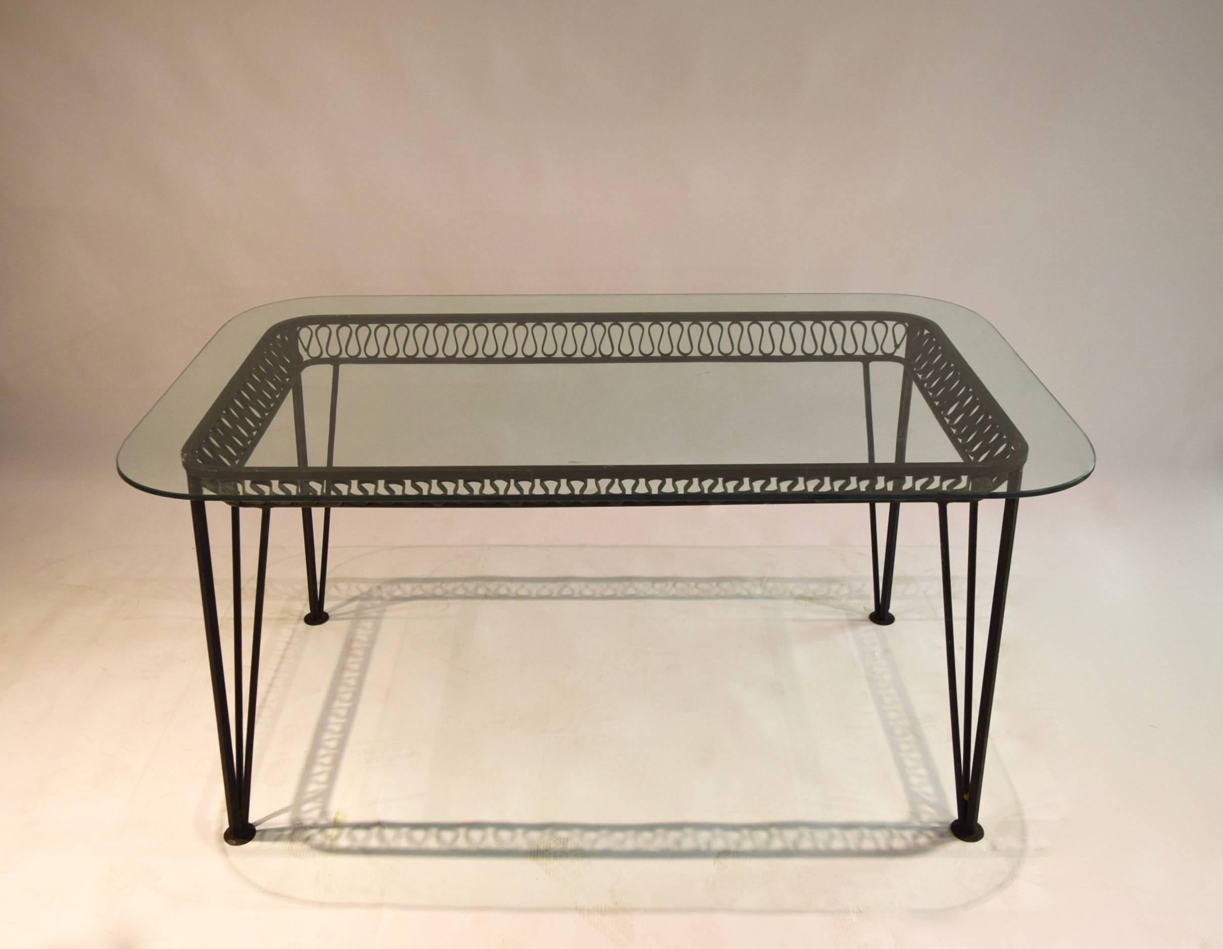 Rectangular black enameled wrought iron, indoor/outdoor use dining table from Salterini's 