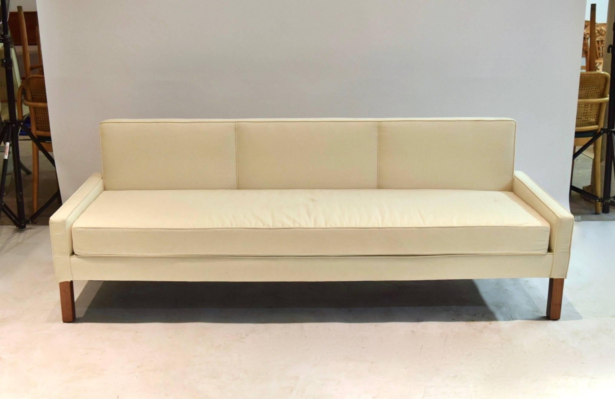Early three-seat Widdicomb sofa in excellent condition, recently reupholstered in muslin and supported on four restored wooden legs.
Measure: Arm height 17 inches.