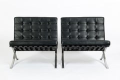 Pair Mid Century Black Leather Barcelona Chairs Mies van der Rohe for Knoll 1977