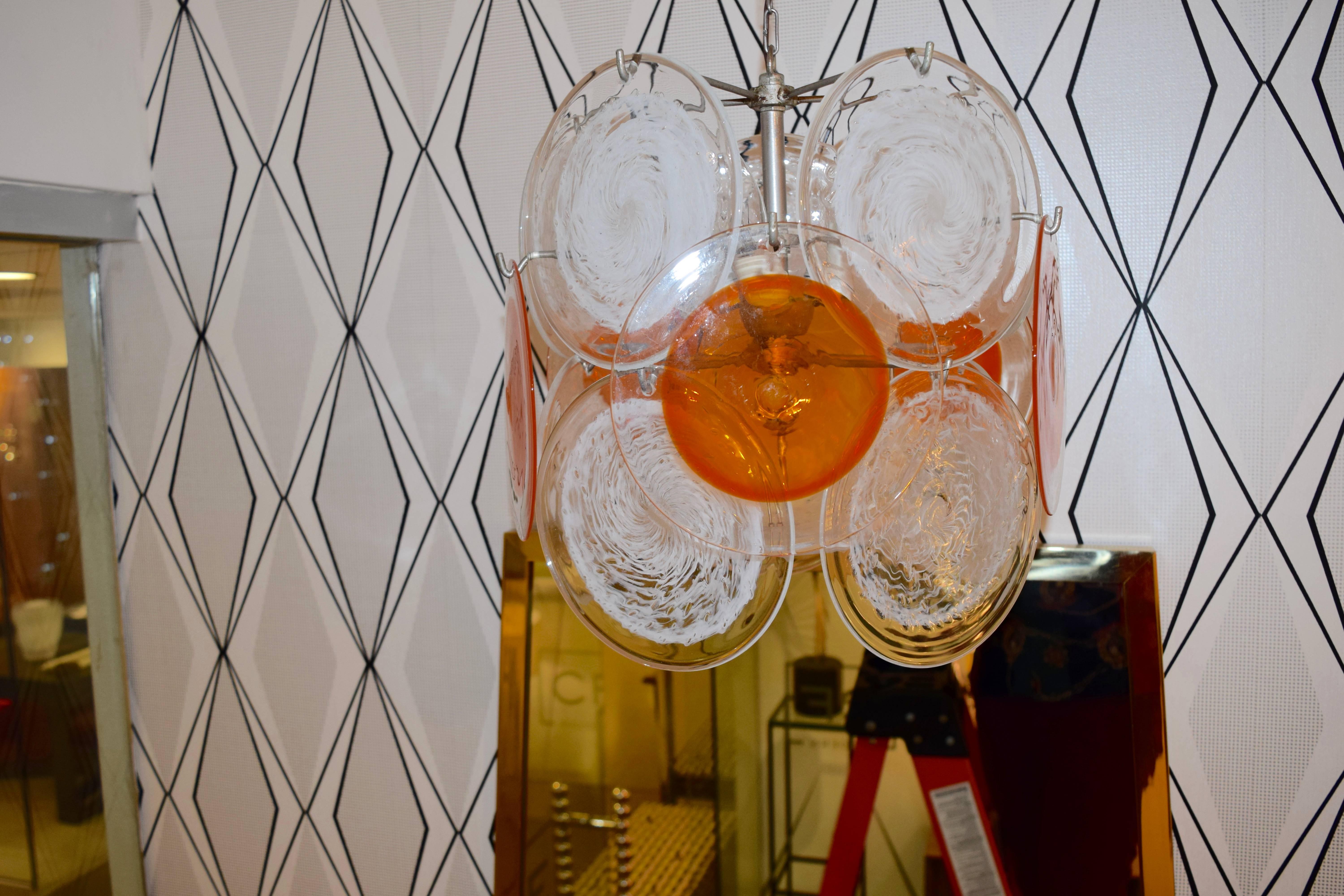 Orange and texture glass Mazzega Chandelier. Each circle has a diameter of 6