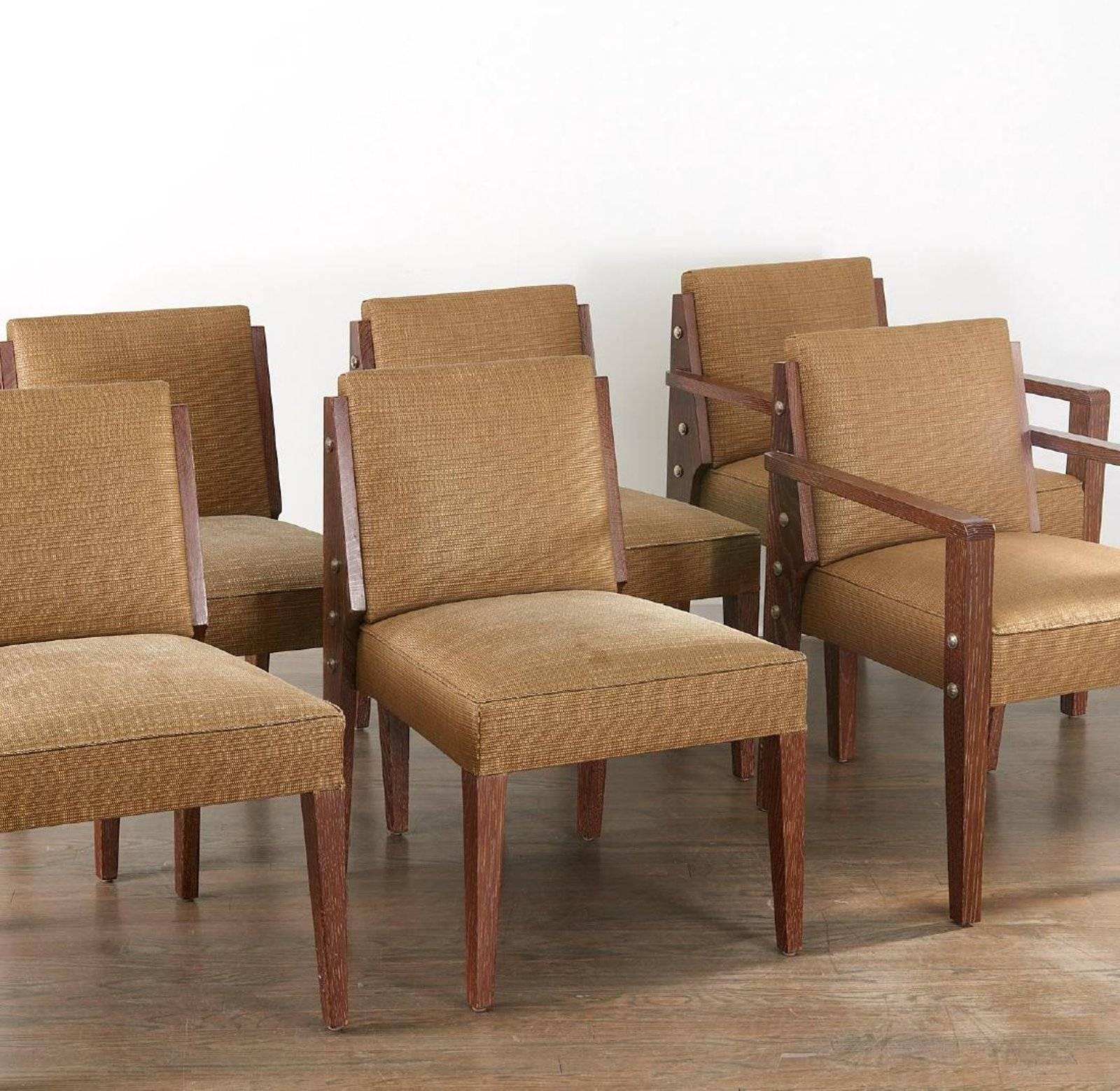 Set of six carte dining chairs in the manner of Paul Dupre Lafon and sold through Holly Hunt by Mattaliano.
Contemporary, American, midcentury inspired design in cerused oak veneer with upholstered back and seat, two armchairs and four side chairs,