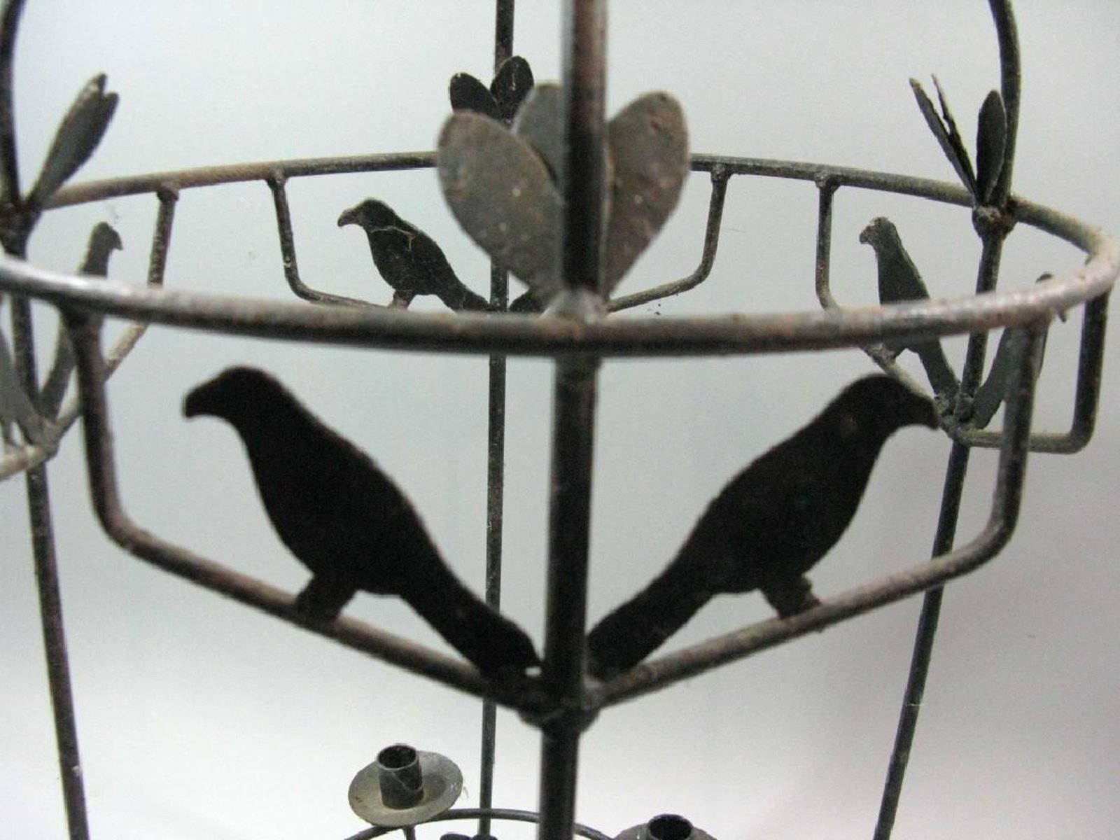 Handmade five-light, circular chandelier mounted with birds and foliage. Measures: 29
