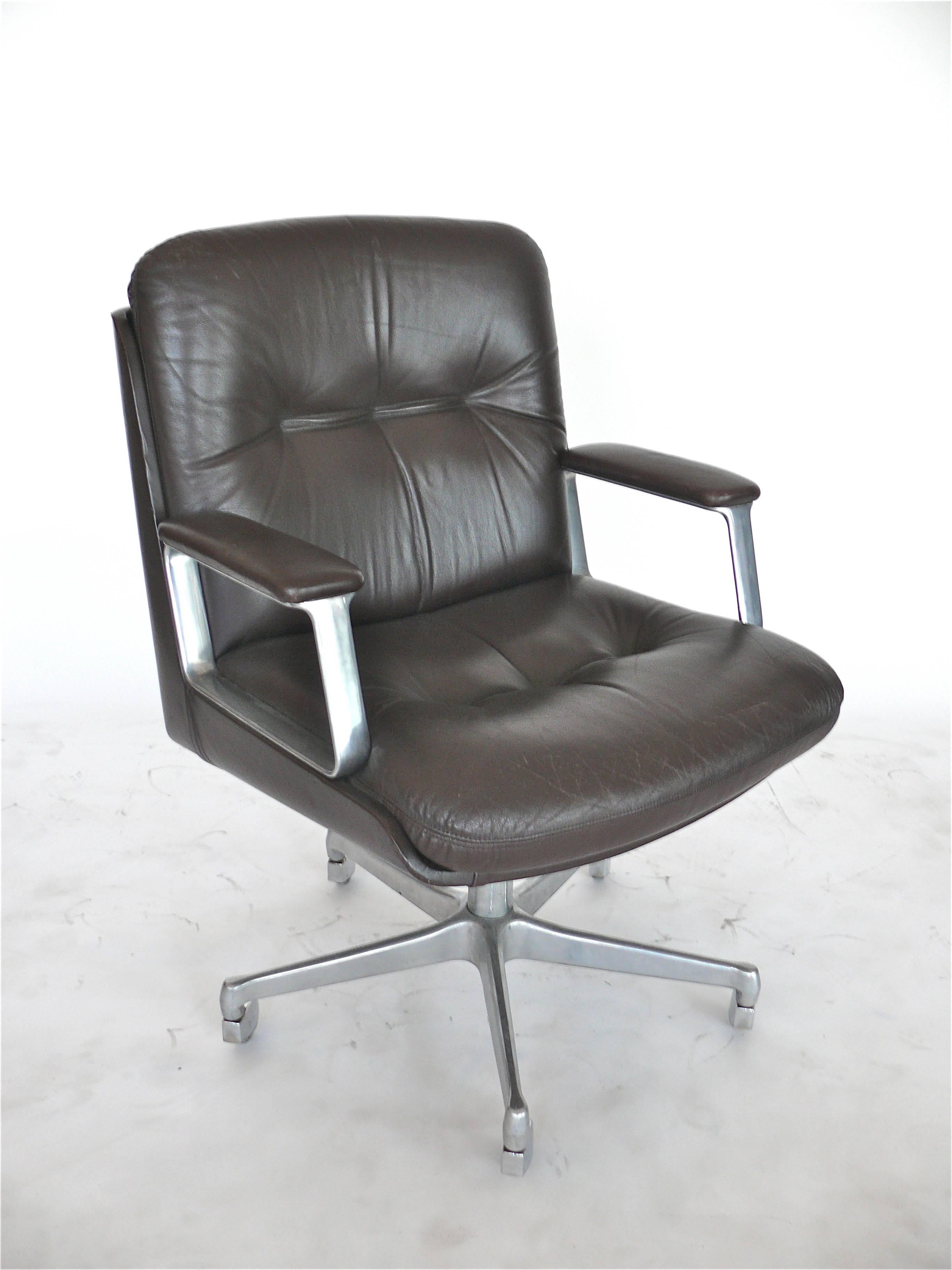 Great Italian leather office chair in the style of Osvaldo Borsani with 5 star aluminum base on original casters. Upholstered in dark chocolate brown leather that is in excellent condition. Chair swivel, tilt and can be adjusted in height. Extremely