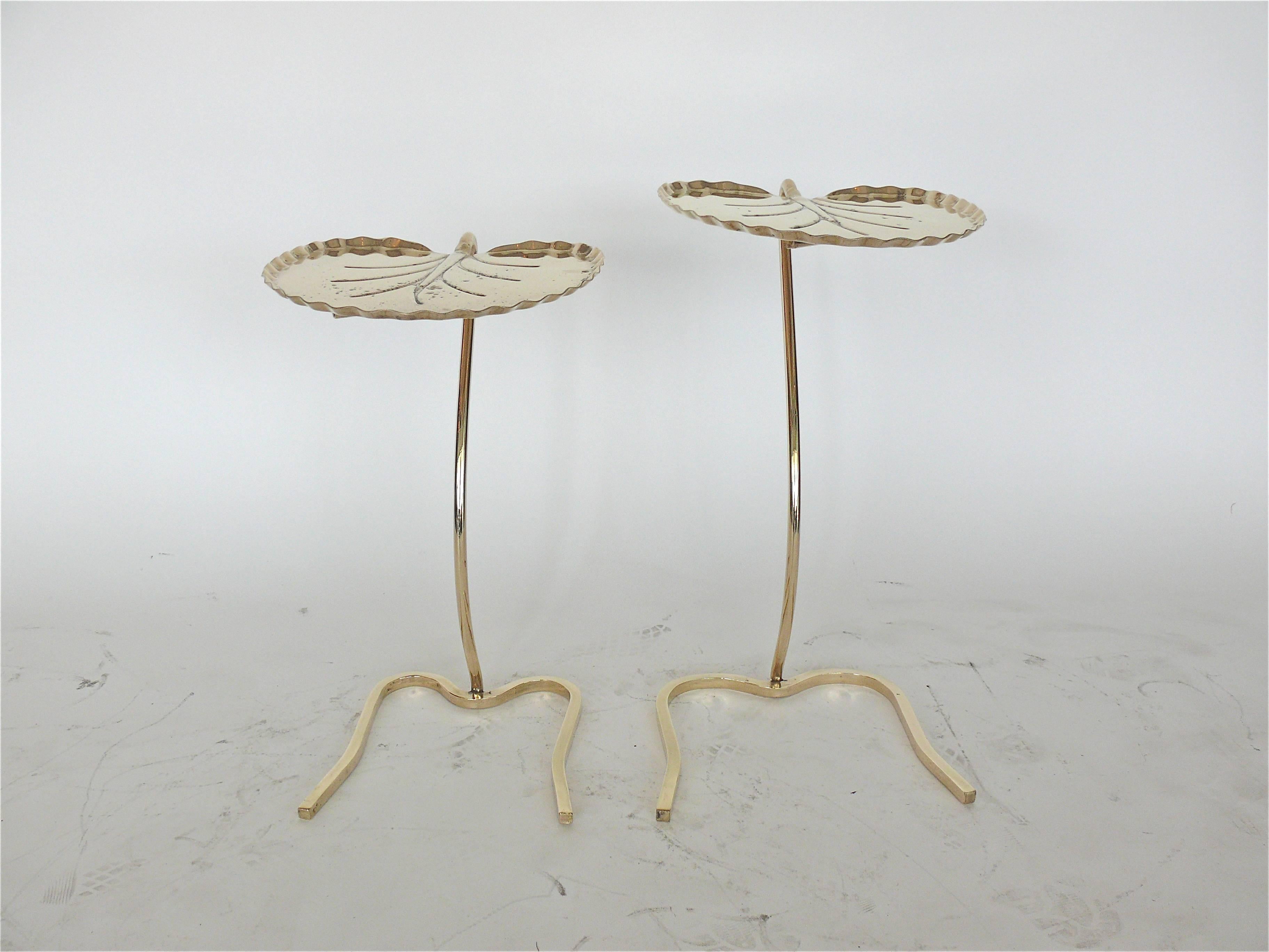 Pair of metal lily pad nesting tables designed by John Salterini. One is larger that the other and they nest together. This set has been newly plated in a stunning polished brass. Nice set suitable for indoor or outdoor use.
Dimensions in listing