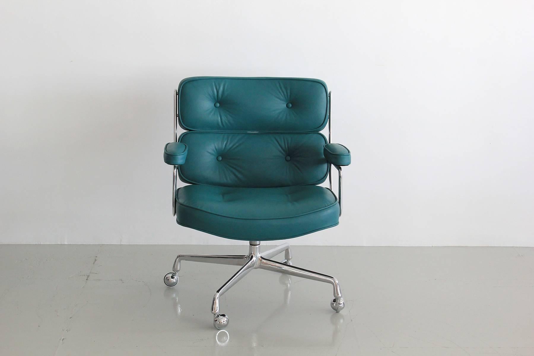 Classic office chair from the Time Life building in New York. New teal blue leather upholstery along with newly polished aluminum base and casters. Chair has an adjustable height with tilt and swivel. Multiple chairs available. Can be COL or COM.