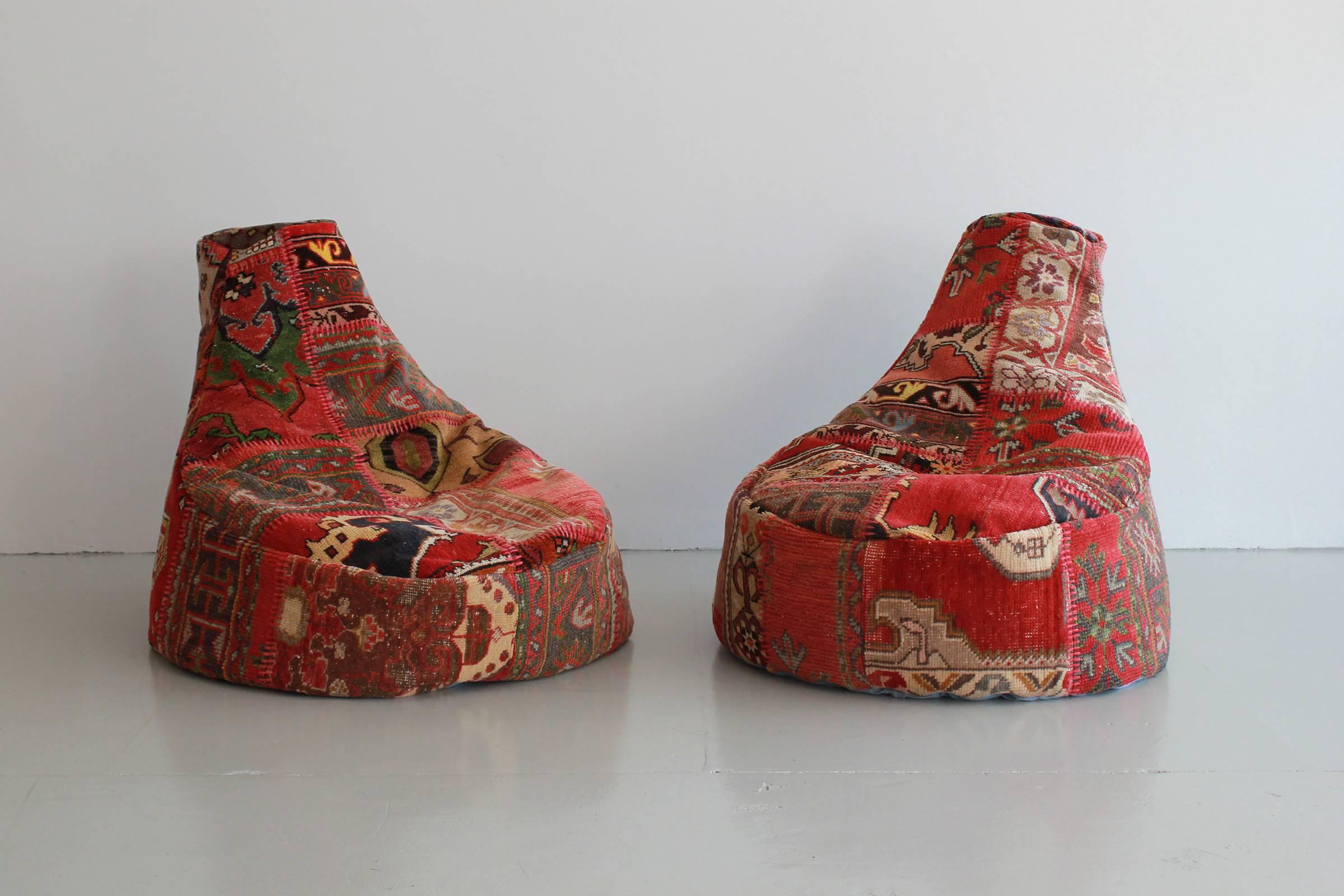 Incredible oversized bean bag chairs newly sewn from over 100 year old Turkish fabrics. Bright colored patchwork of differing patterns and designs. Made of a heavy Kilim wool fabric and stuffed with new foam beans. Multiple quantity available. Large