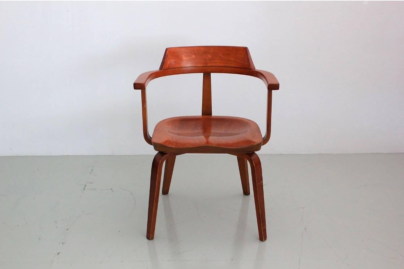 Extremely rare set of W199 armchairs designed by architect Walter Gropius and Ben Thompson for Thonet. These early 1950s armchairs have a wonderful original patina and are constructed of solid nutwood.
An excellent example of architectural design