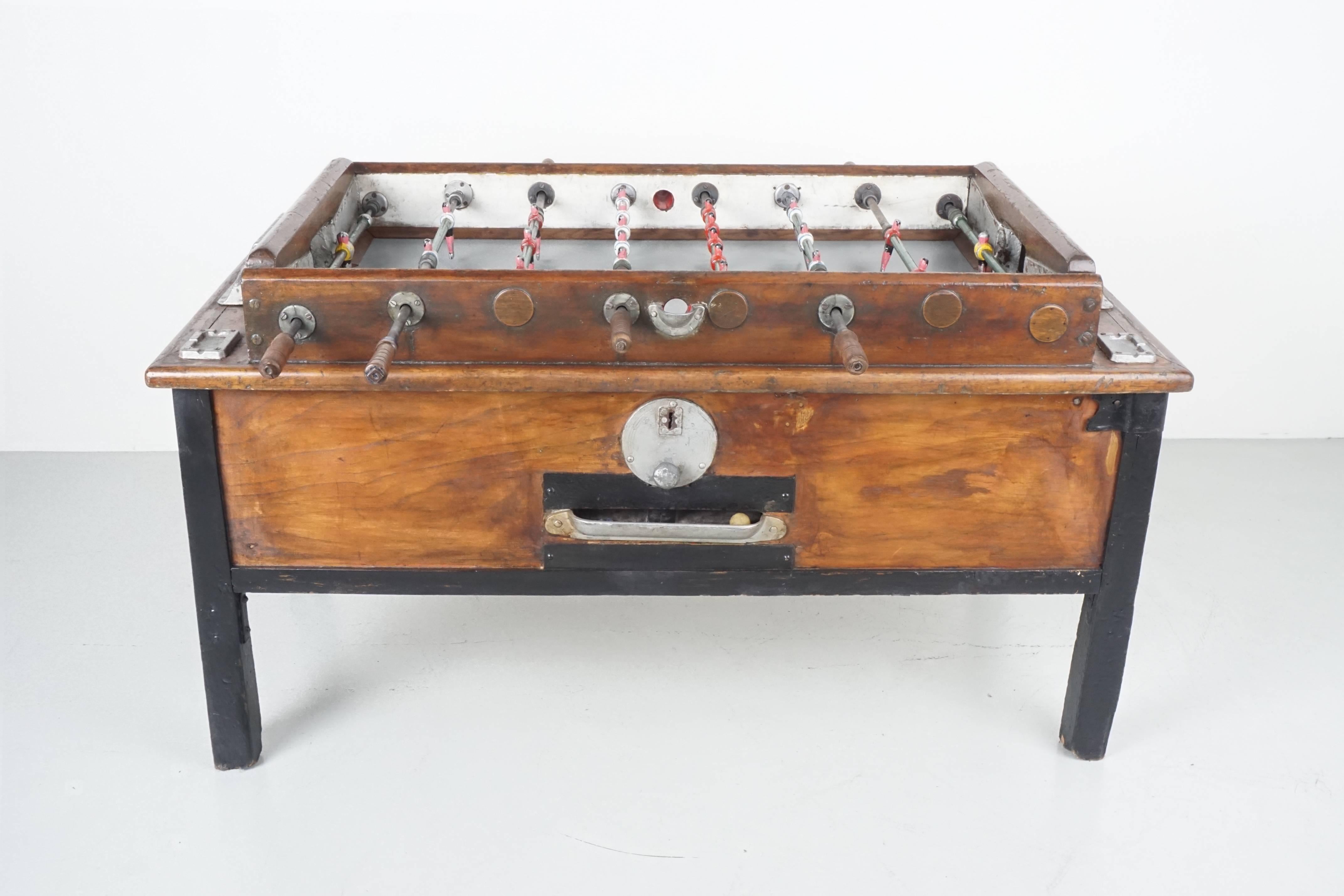 1940s Italian foosball table with wonderful patina. Professionally restored with original players, new linoleum playing field, original metal goals, wood score pegs and three balls.

