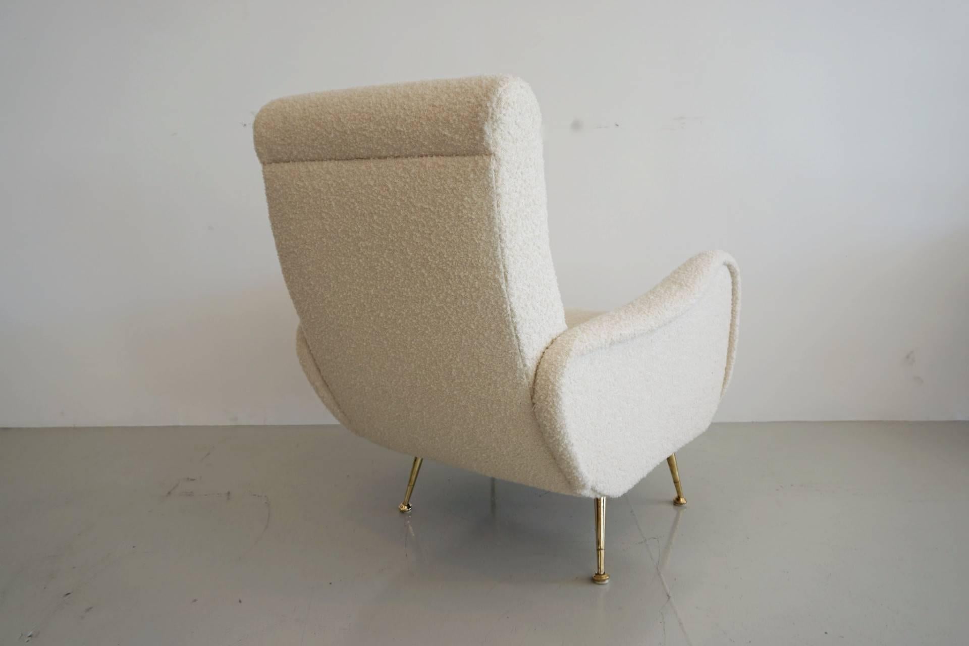 Gorgeous pair of Italian sculptural chairs in the style of Marco Zanuso. Newly upholstered in a creamy white wool bouclé´ fabric with a newly plated brass base. Sleek lines. Fantastic design.