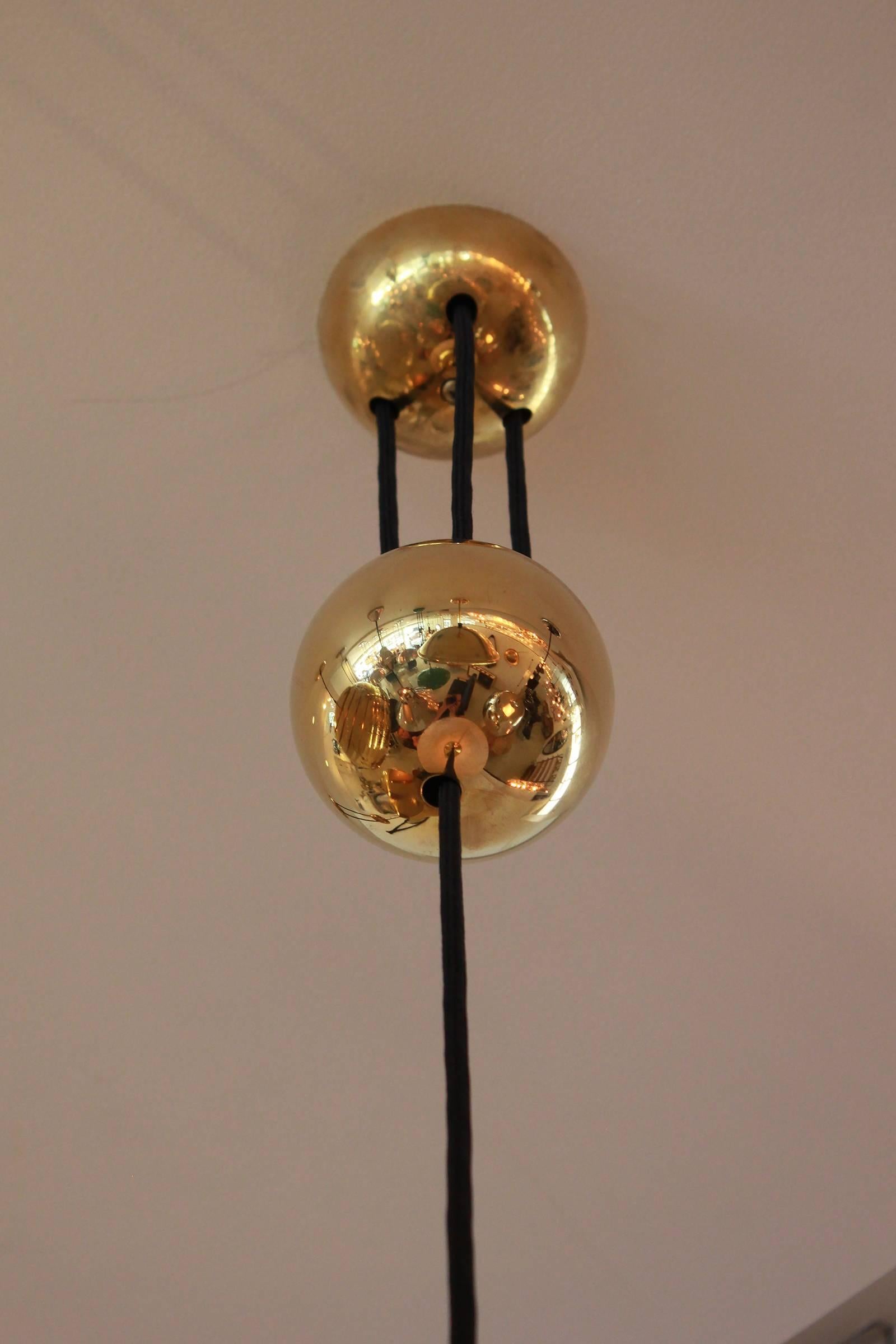 Pendant by Florian Schulz with shade and brass counter balance.