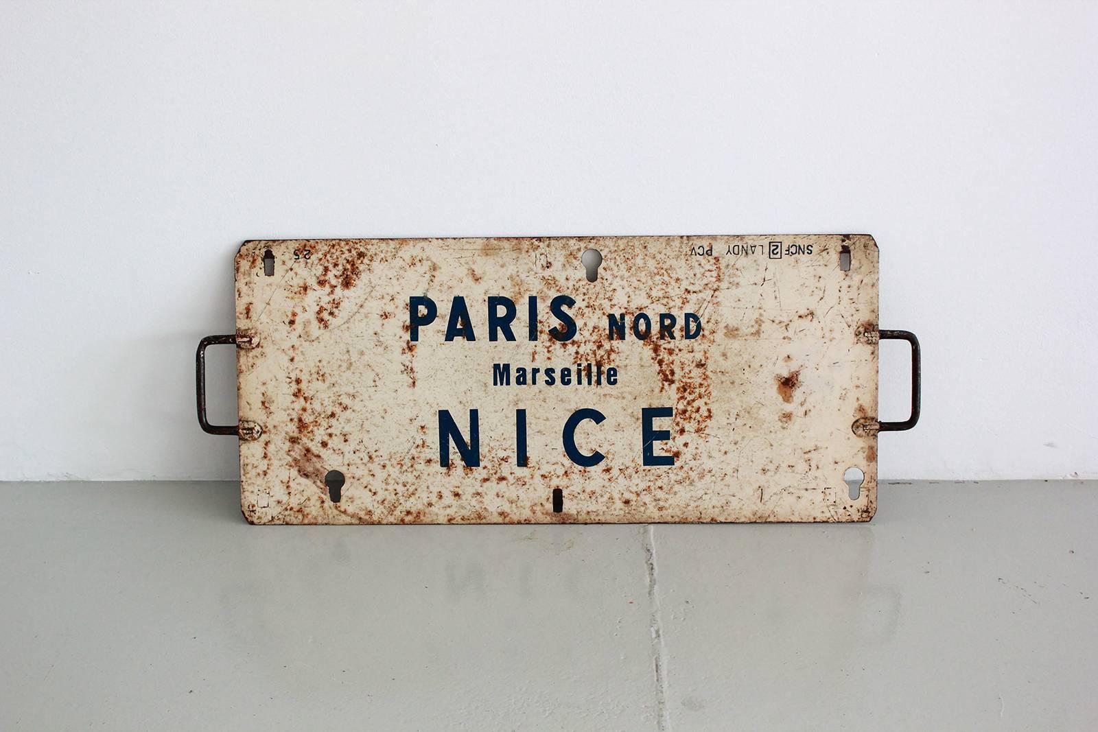 Fantastic old French train sign with wonderful Patina. 
Nice, Marseille, Paris in blue lettering.
 