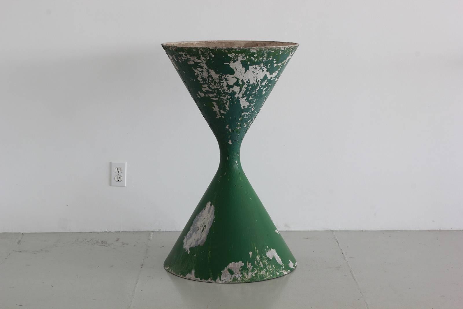 Extraordinary Willy Guhl hourglass shaped pot with original green paint patina.