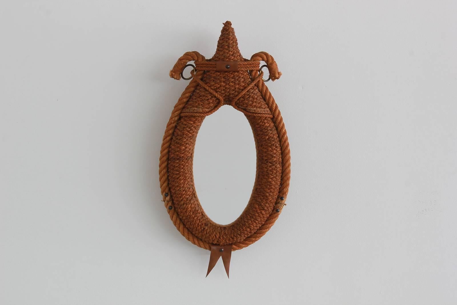Decorative rope mirror in the style of Audoux Minet,
circa 1950s.
  