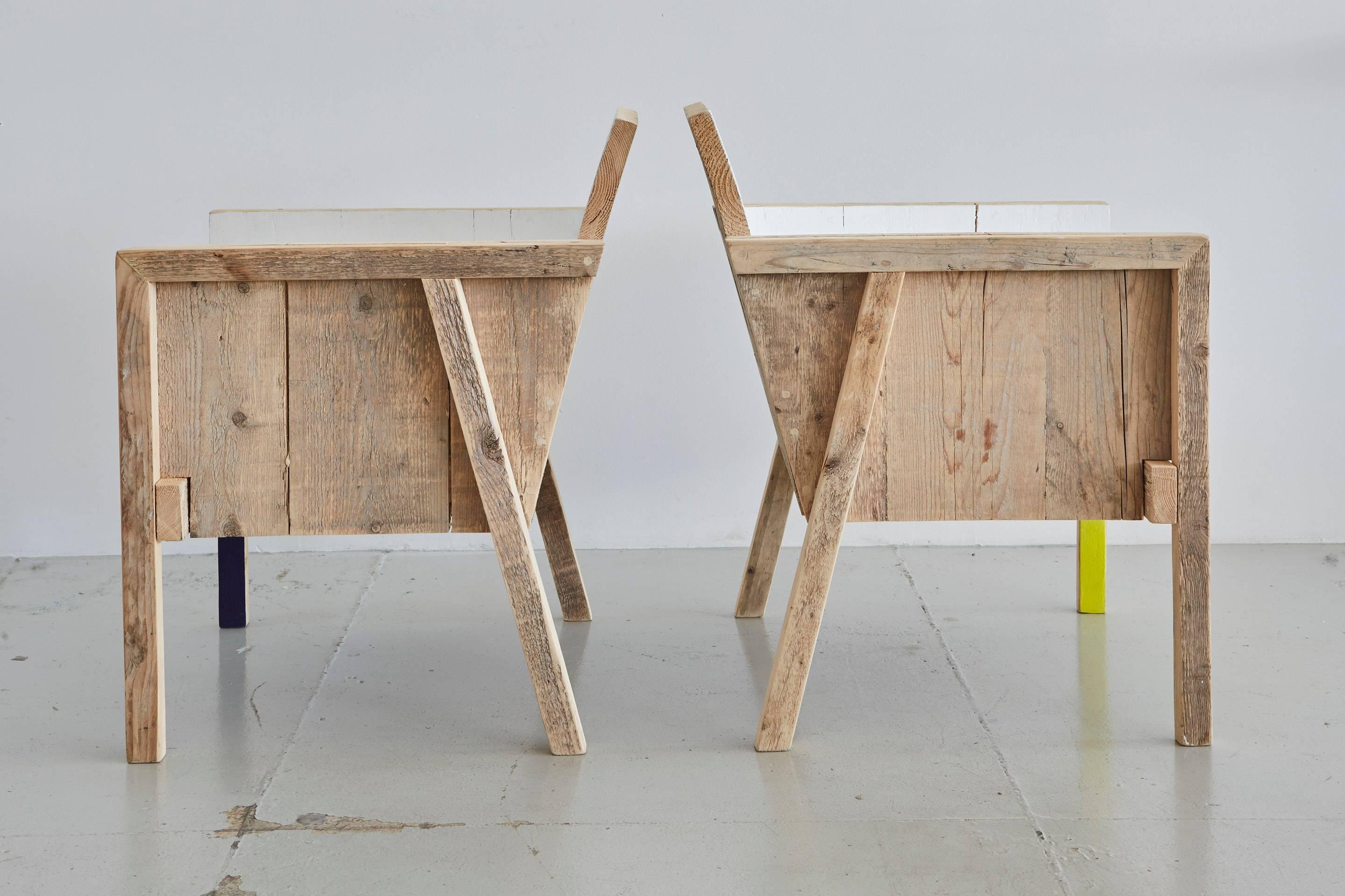 Pair of whimsical wood chairs by Netherland designer, Helen Vergouwen.
Great angles, wood cube shape and primary blue and yellow detail on the face and down one leg of each chair.