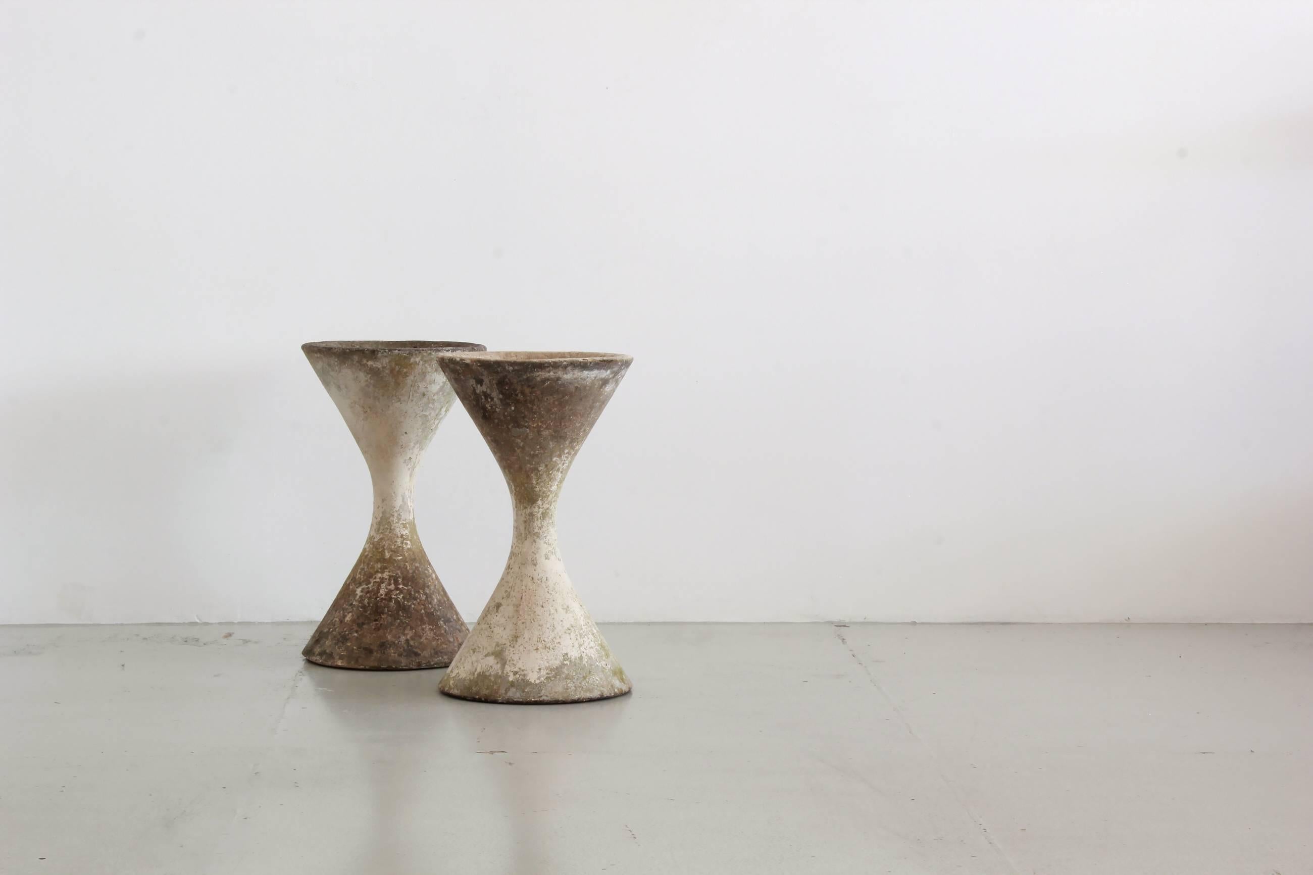 Fantastic Willy Guhl hourglass planters with much desired original patina.