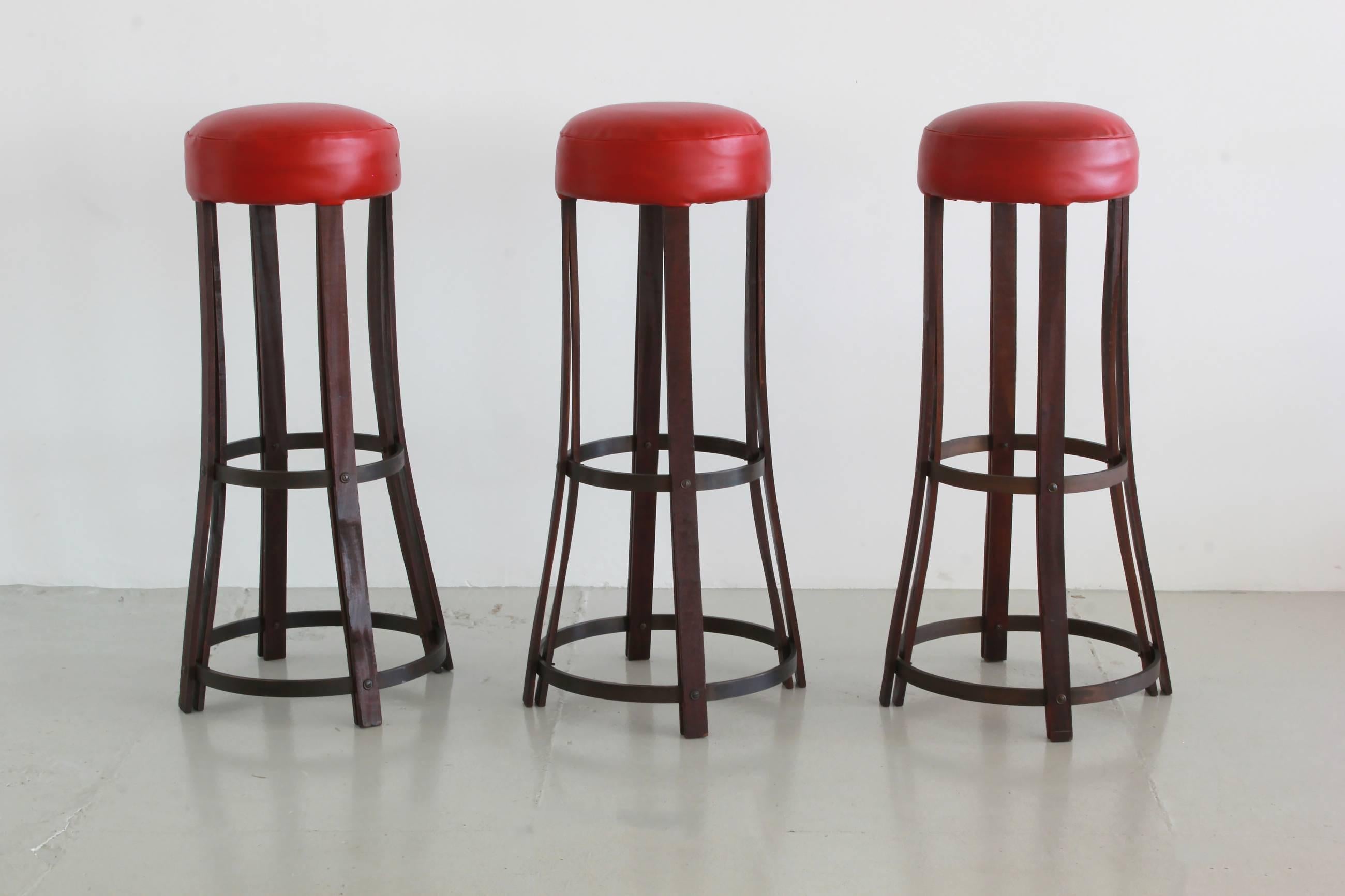 Great set of three Italian barstools with curved legs and original leather upholstered seat.
Great simple lines.
