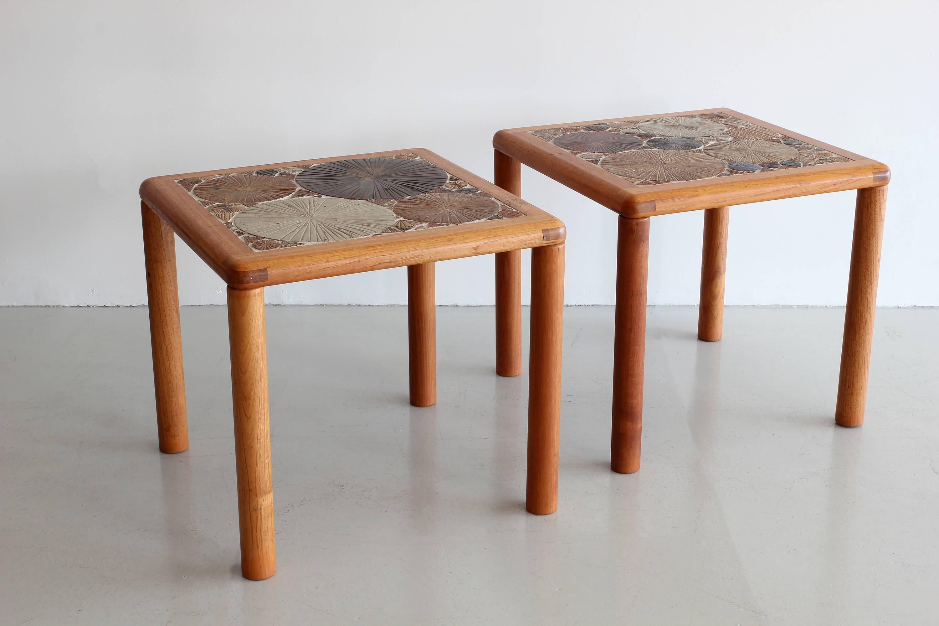 Fantastic pair of ceramic tile end tables beautiful crafted and signed by Danish Modern designer Tue Poulsen for Haslev Modern. 

Gorgeous textured tile, oak legs and frame, hand signed. 

Professionally oiled and waxed to retain original