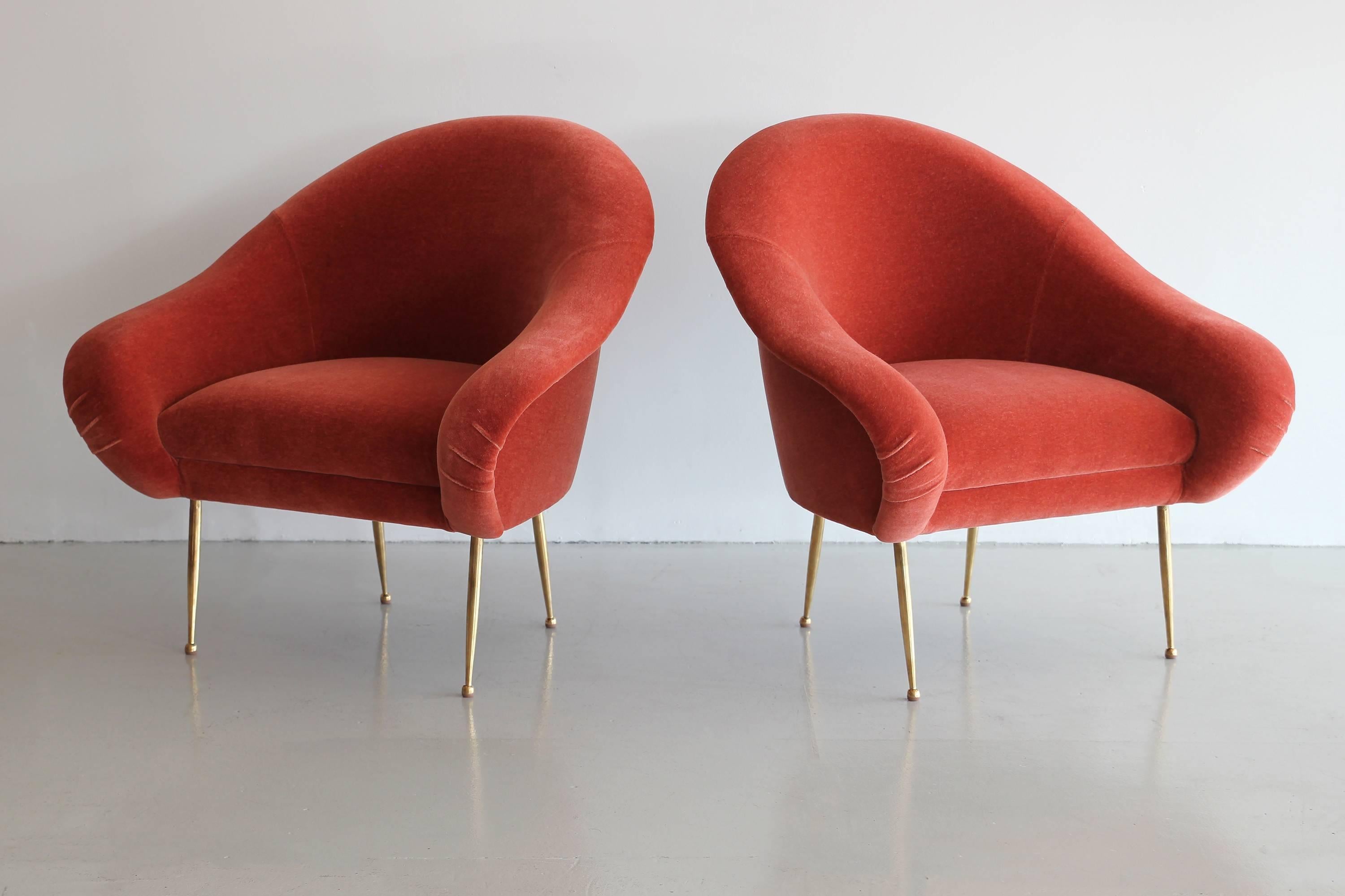 Pair of Italian slipper chairs newly produced by ORANGE with beautiful curved lines and solid brass legs..  
Shown in burnt orange mohair and priced COM.   
