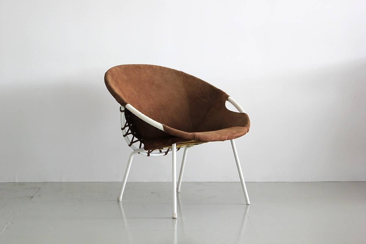 Austrian white iron and brown suede scoop chair with whip stitch detail.